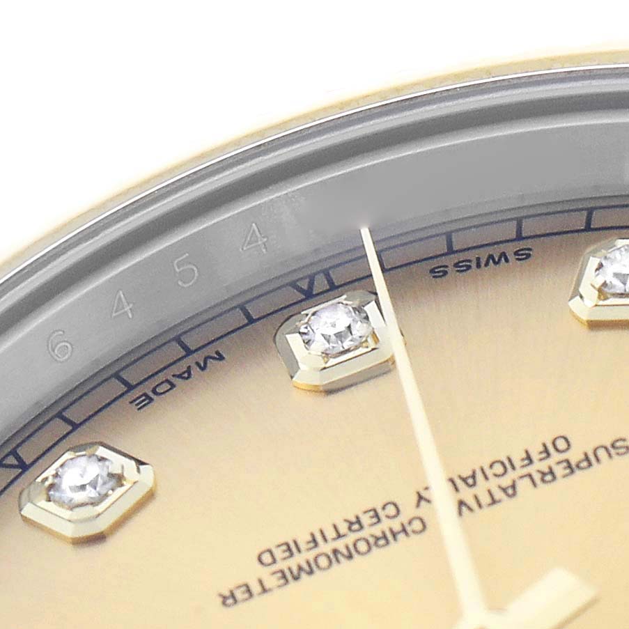 The image shows a close-up of the Rolex Datejust 41 116333 Men's Steel and Gold (two tone) Champagne Dial dial with diamond hour markers and part of the bezel.