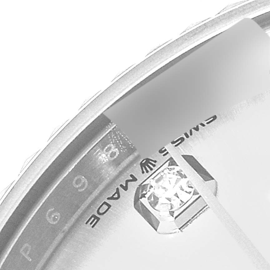 This image shows a close-up angle of the dial and part of the bezel of a Rolex Datejust 278274 Women's Stainless Steel Silver Dial 278274 Women's Stainless Steel Silver Dial watch, highlighting the "Swiss Made" inscription and a diamond marker.