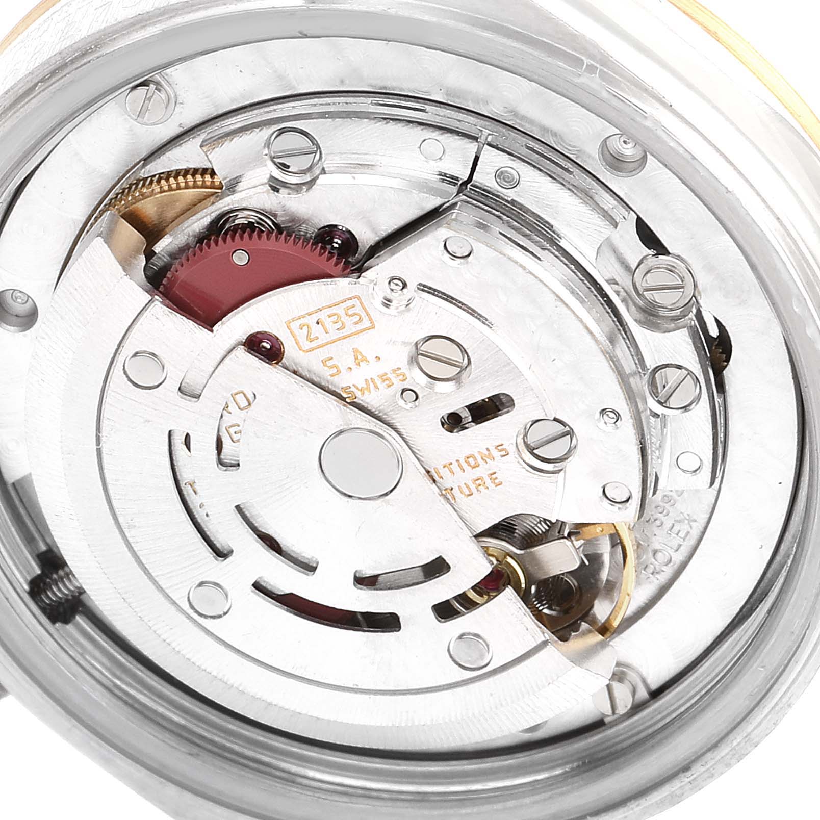The image shows the internal mechanism of a Mid-Size Rolex watch, highlighting the movement components from a close-up angle.