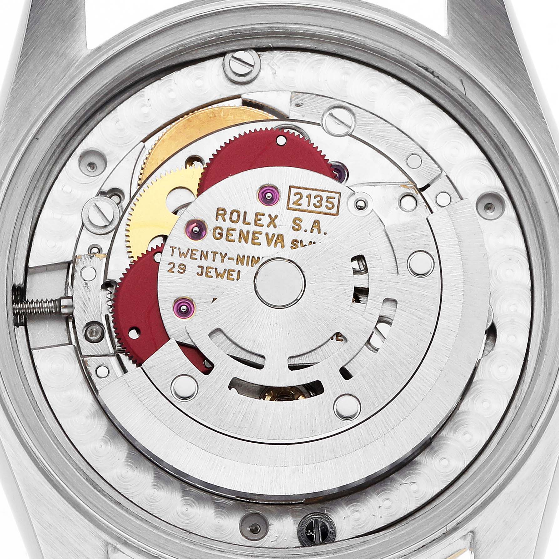 The image shows a close-up view of the Rolex Datejust 68273 Women's Stainless Steel Black Dial's movement, revealing gears and the rotor mechanism.