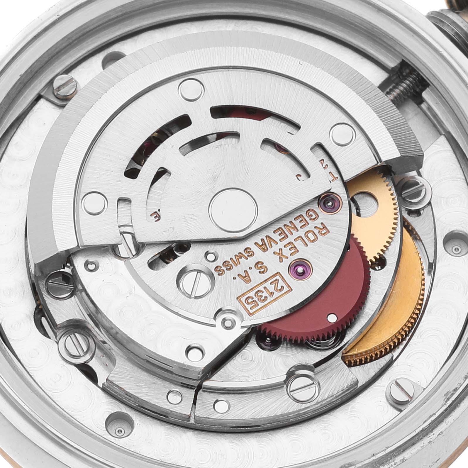 The image shows the inner mechanical movement and components of a Rolex Mid-Size 68243 Women's Steel and Gold (two tone) Beige Dial 68243 Women's Steel and Gold (two tone) Beige Dial model watch from a close-up, top-down angle.
