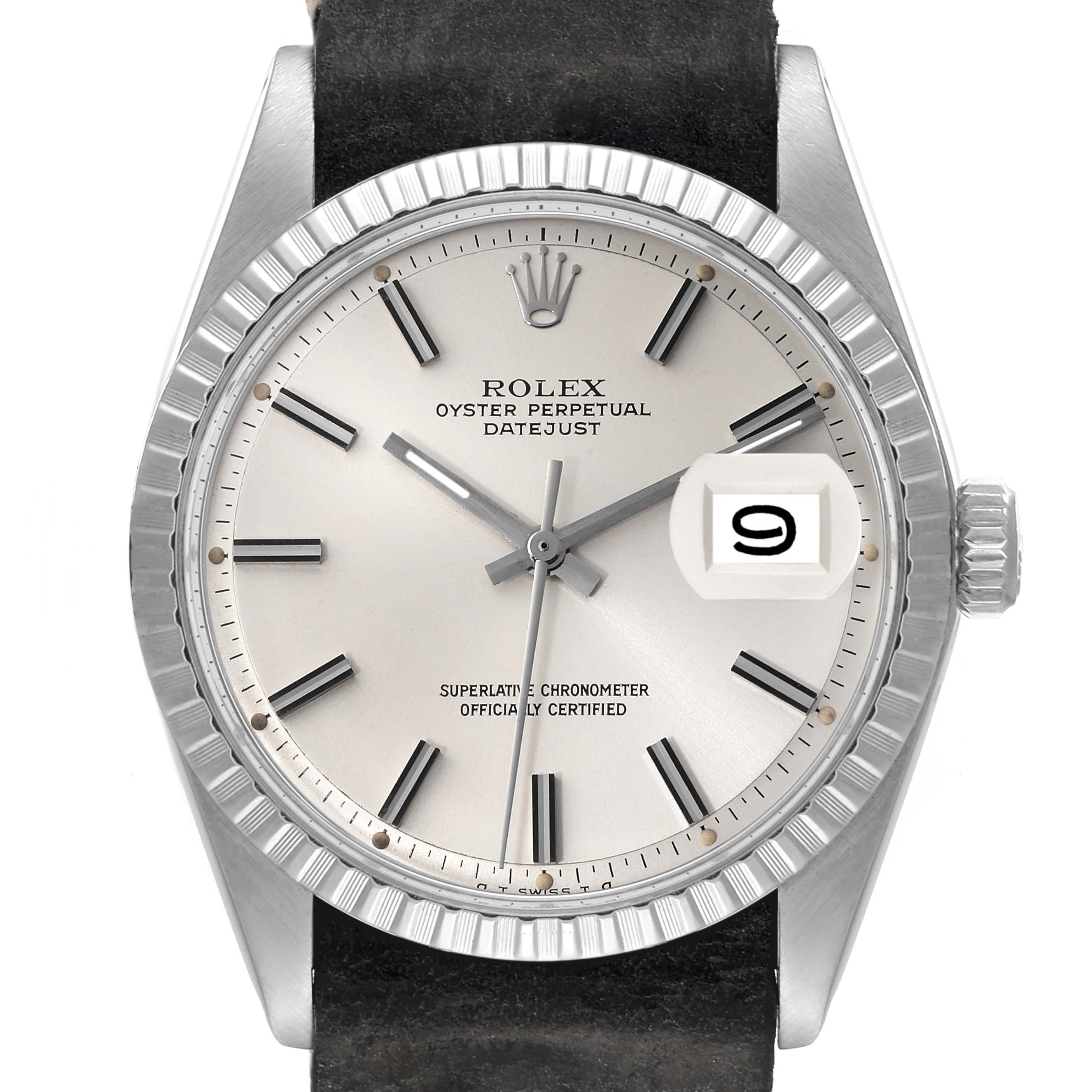 This image shows a close-up of the Rolex Vintage Collection 1603 Men
s Stainless Steel Silver Dial 1603 Men
s Stainless Steel Silver Dial Datejust watch face, displaying the dial, hour markers, hands, crown, and leather strap.