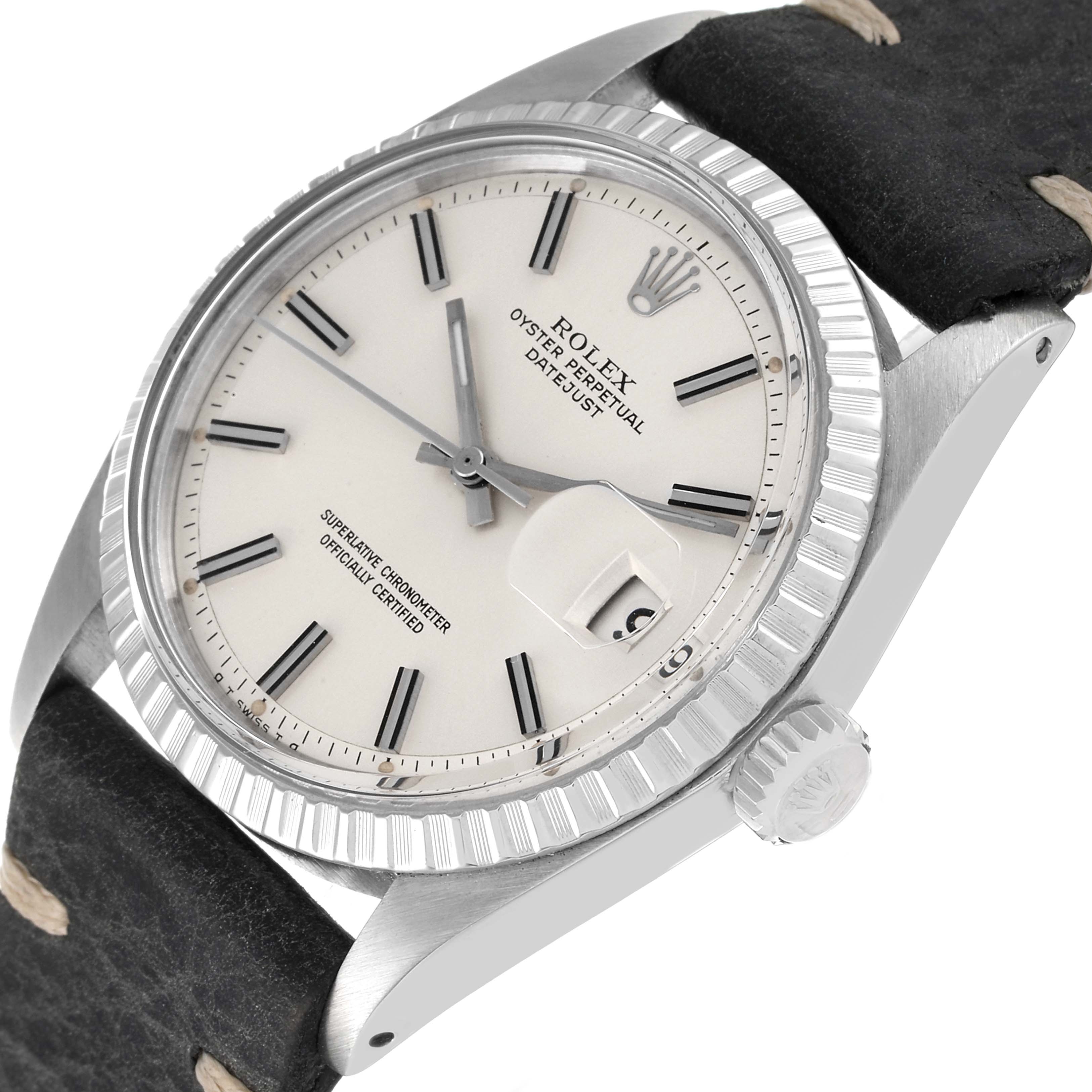 The image shows an oblique view of a Rolex Vintage Collection 1603 Men
s Stainless Steel Silver Dial 1603 Men
s Stainless Steel Silver Dial Oyster Perpetual Datejust watch, highlighting its face, bezel, case, crown, and strap.