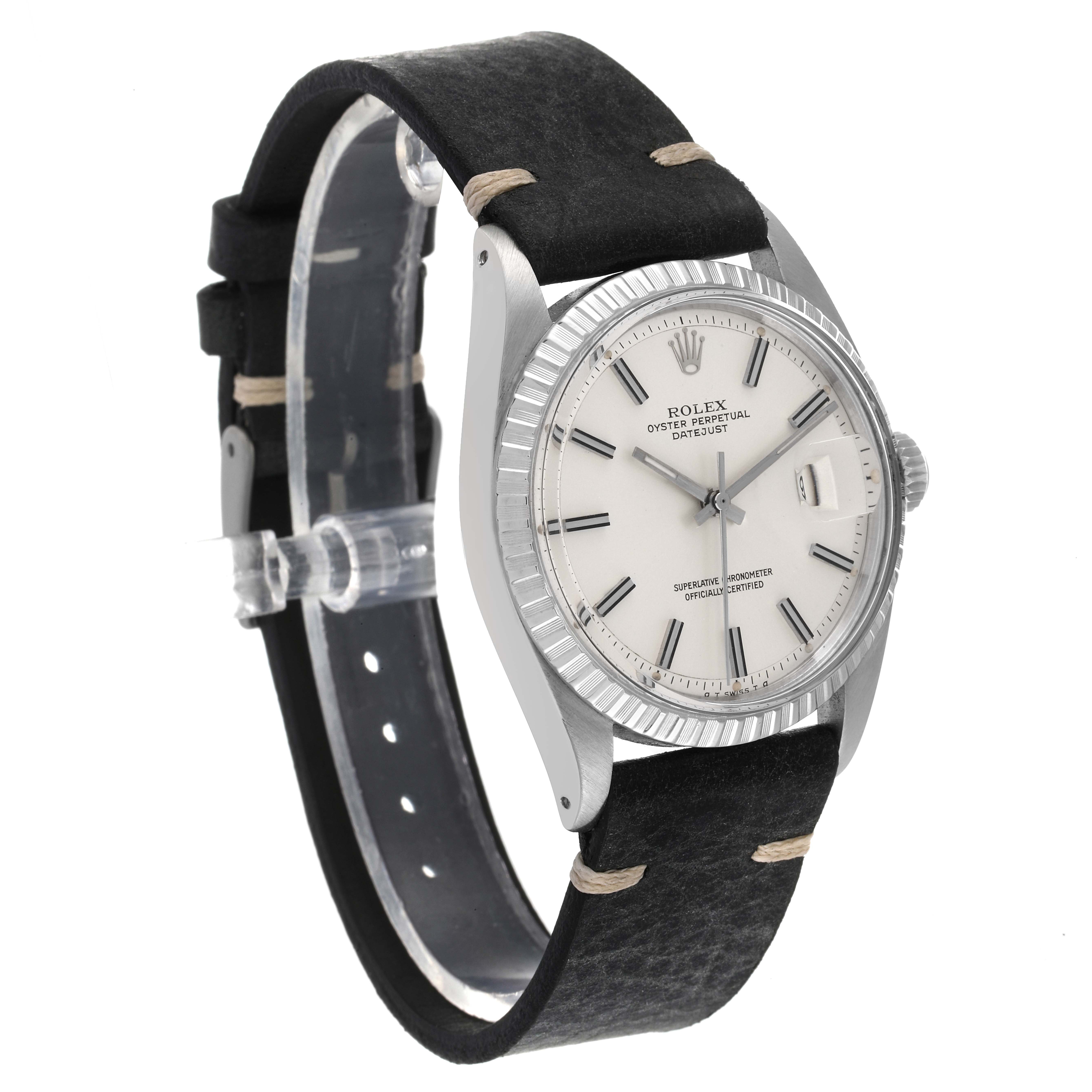 The image shows a side angle of the Rolex Vintage Collection 1603 Men
s Stainless Steel Silver Dial 1603 Men
s Stainless Steel Silver Dial watch, highlighting its face, bezel, and black leather strap.