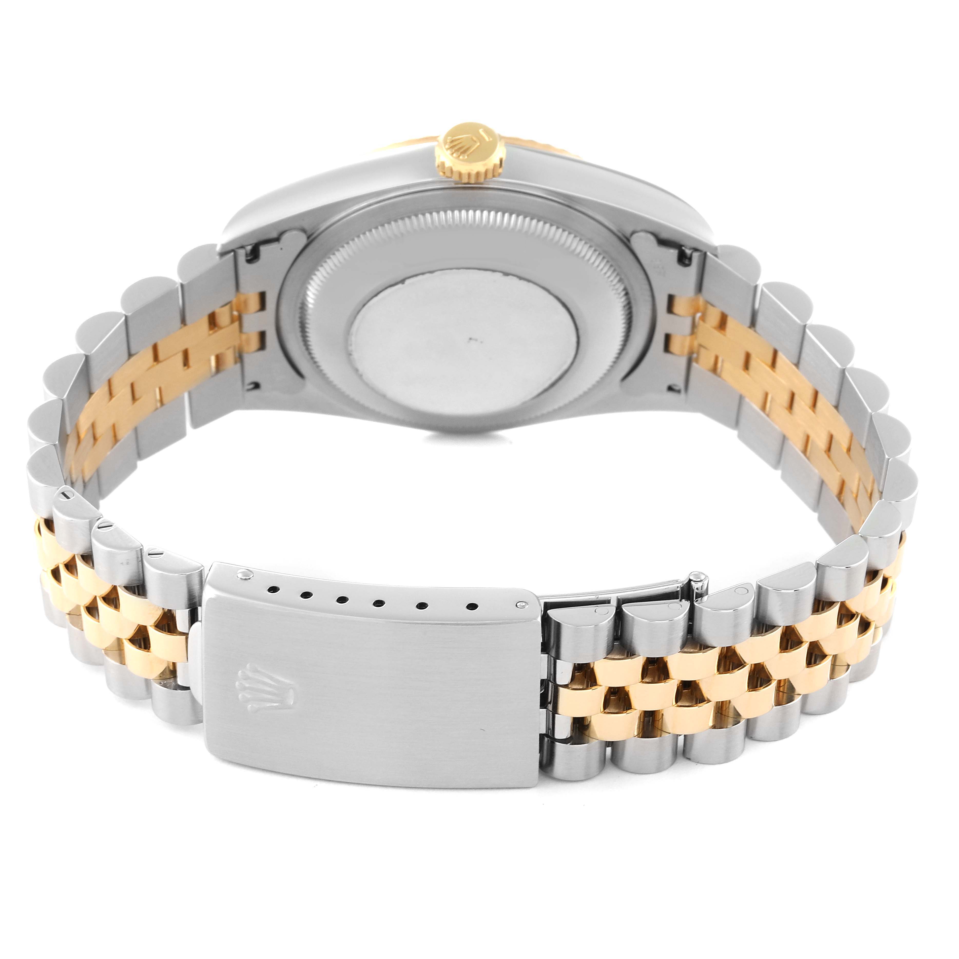 The image shows the back case and bracelet of a Rolex Datejust 16233 Men's Steel and Gold (two tone) Grey Dial 16233 Men's Steel and Gold (two tone) Grey Dial, featuring a combination of silver and gold links.