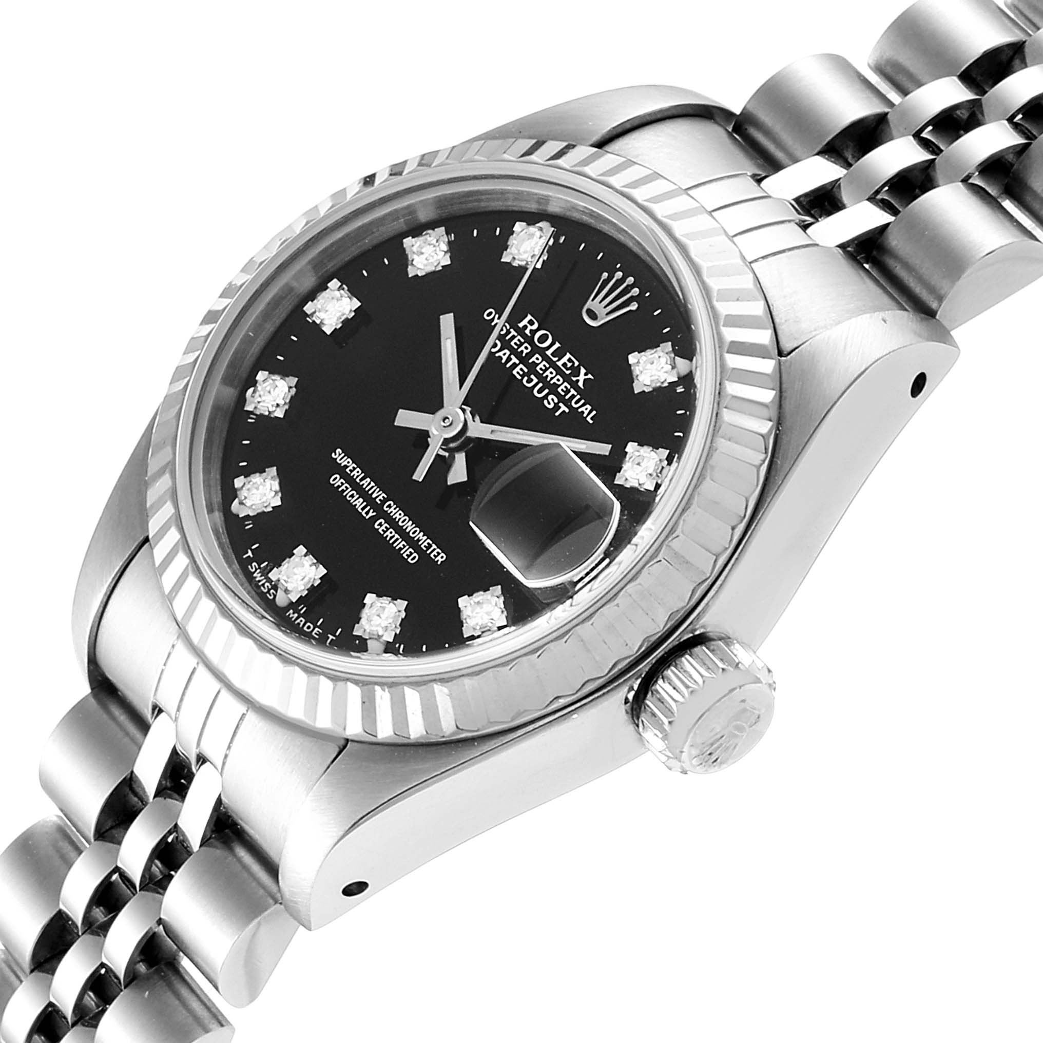 The Rolex Datejust 69174 Women's Stainless Steel Black Dial 69174 Women's Stainless Steel Black Dial model watch is shown at an angled view, capturing the watch face, bezel, case, crown, and part of the bracelet.