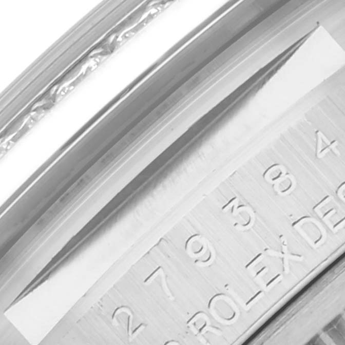 The image shows the engraved serial number on the inner bezel of a Rolex Datejust 279384RBR Women's Stainless Steel Mother of Pearl Dial 279384RBR Women's Stainless Steel Mother of Pearl Dial watch at a close-up angle.