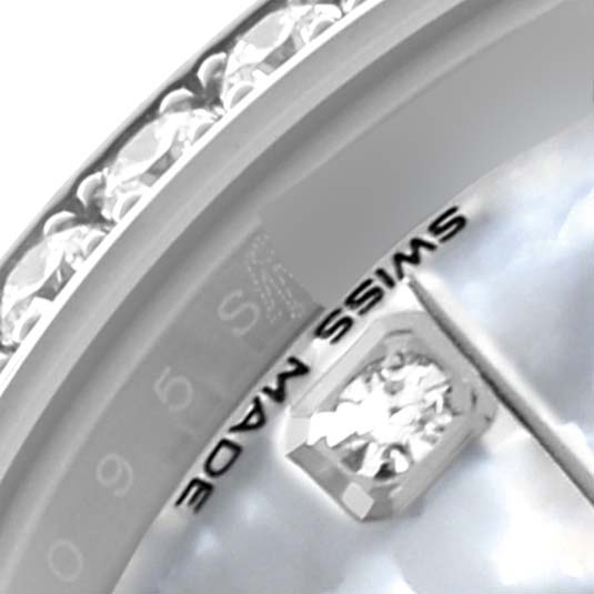 The image shows a close-up of the Rolex Datejust 279384RBR Women's Stainless Steel Mother of Pearl Dial 279384RBR Women's Stainless Steel Mother of Pearl Dial watch face, highlighting the diamond hour marker and part of the bezel.