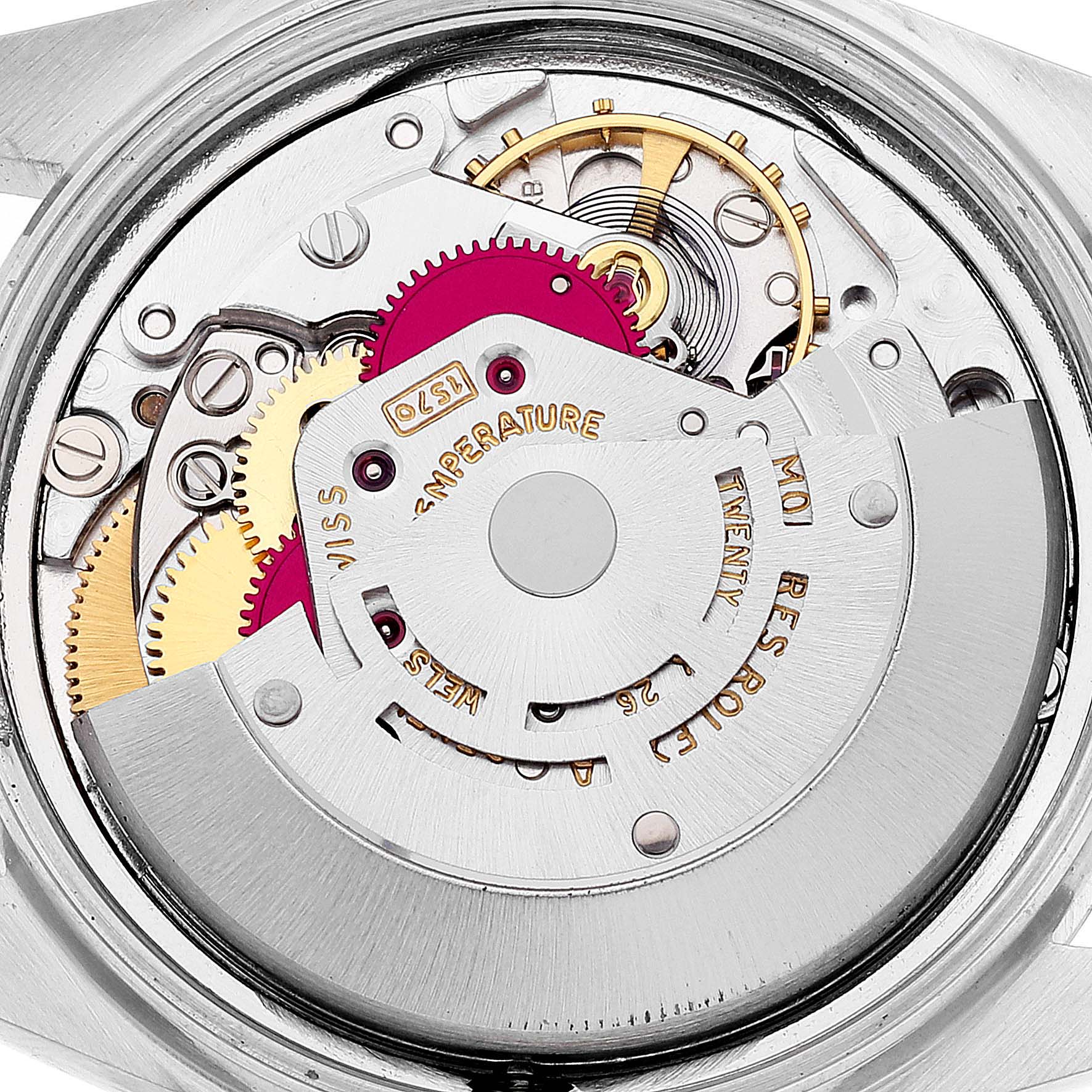 The image shows the intricate internal mechanism of a Rolex Datejust 1601 Men
s Stainless Steel Silver Dial 1601 Men
s Stainless Steel Silver Dial watch, focusing on the movement and gears.