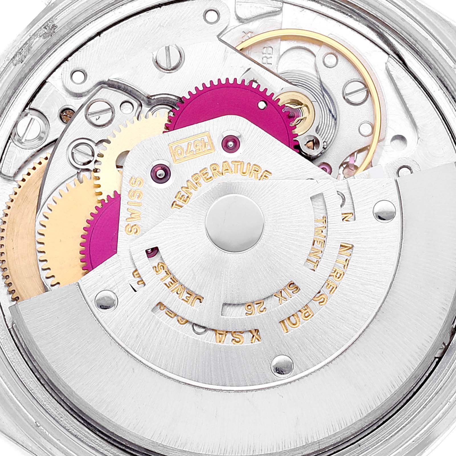 This image shows a close-up of the internal mechanics of a Rolex Datejust 1601 Men
s Stainless Steel Silver Dial 1601 Men
s Stainless Steel Silver Dial watch, focusing on the gears and movement parts.
