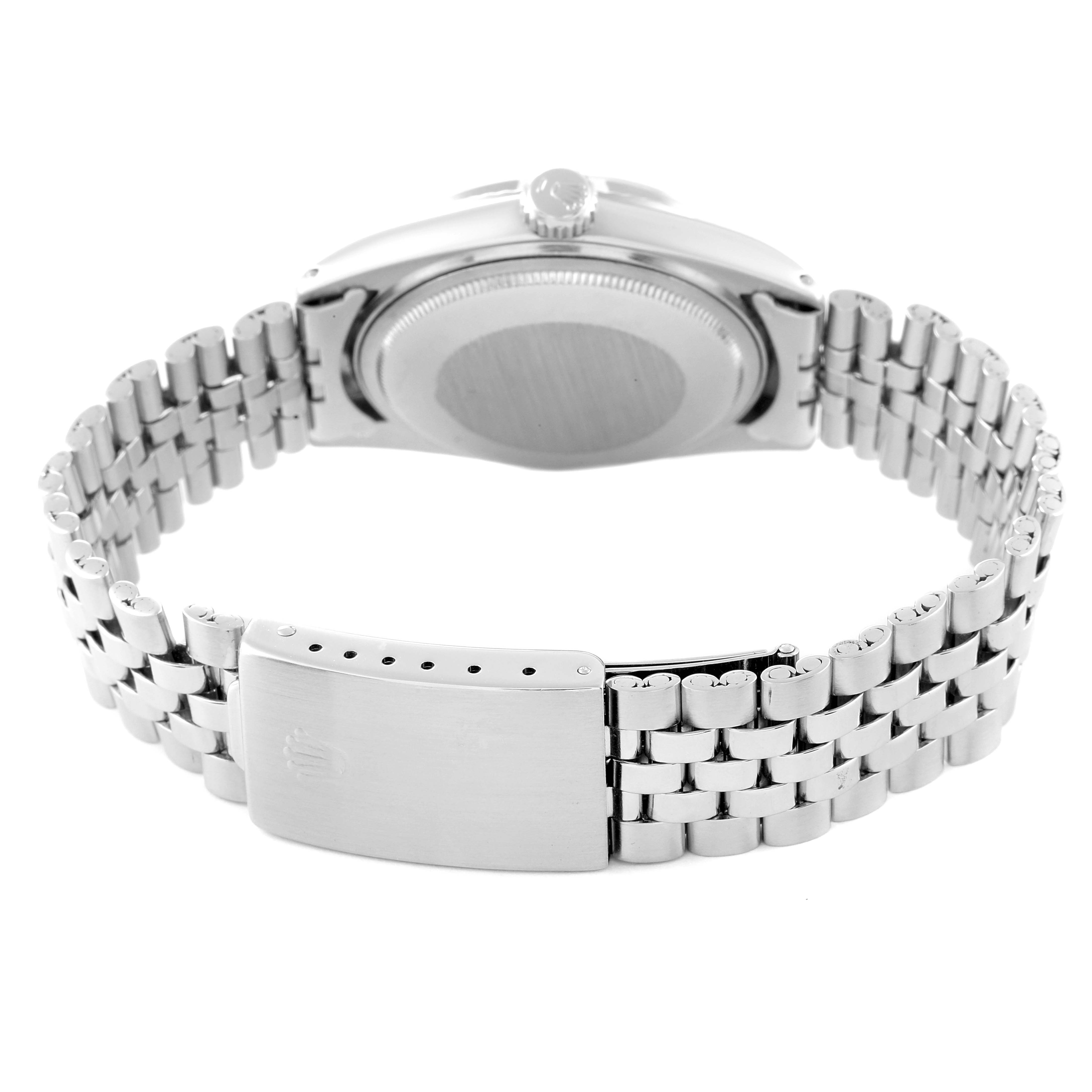 This image shows the back and bracelet clasp of a Rolex Datejust 1601 Men
s Stainless Steel Silver Dial 1601 Men
s Stainless Steel Silver Dial watch from a low rear angle.