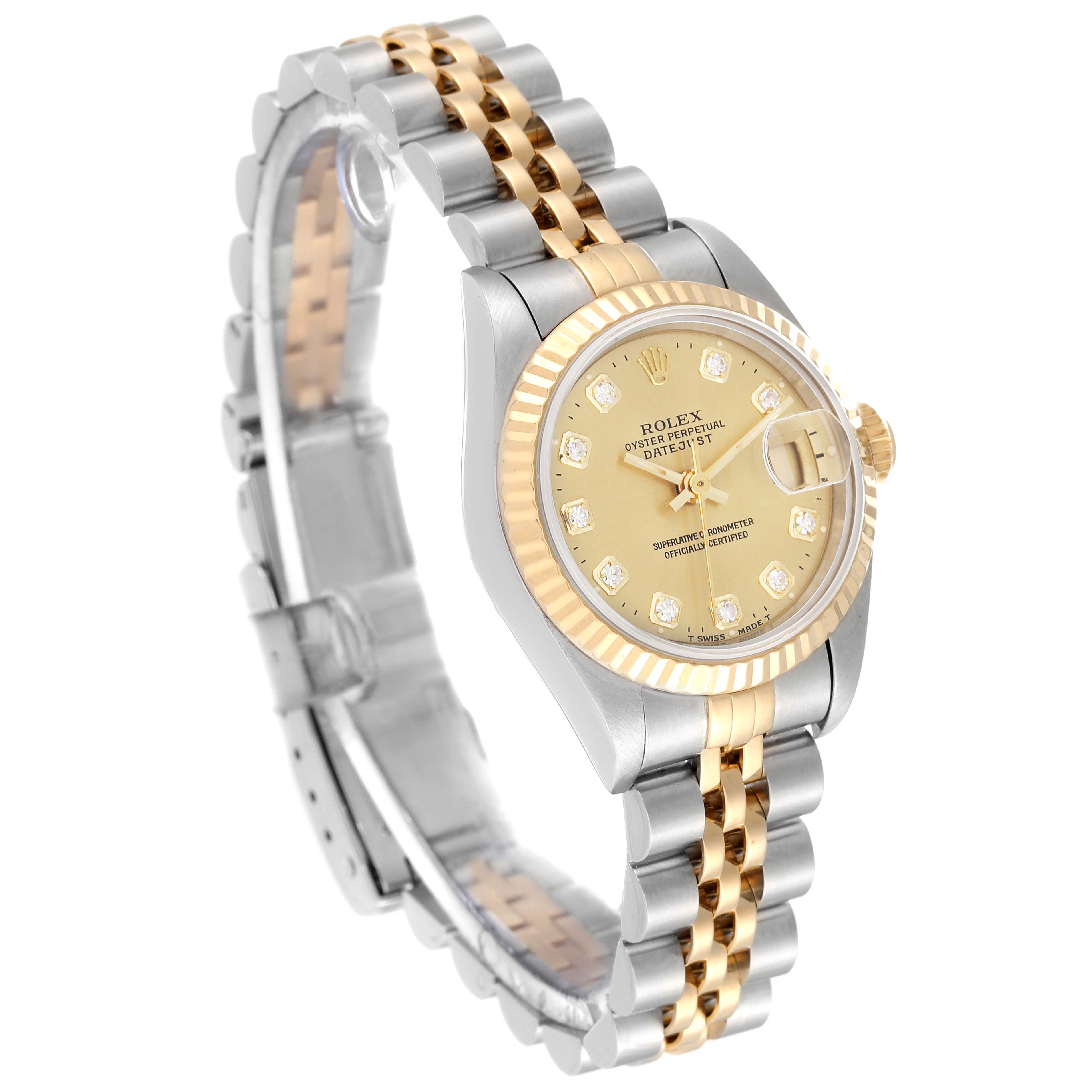 The Rolex Datejust 69173 Women's Steel and Gold (two tone) Champagne Dial 69173 Women's Steel and Gold (two tone) Champagne Dial watch is shown at an angle, displaying its bracelet, bezel, and dial with hour markers.