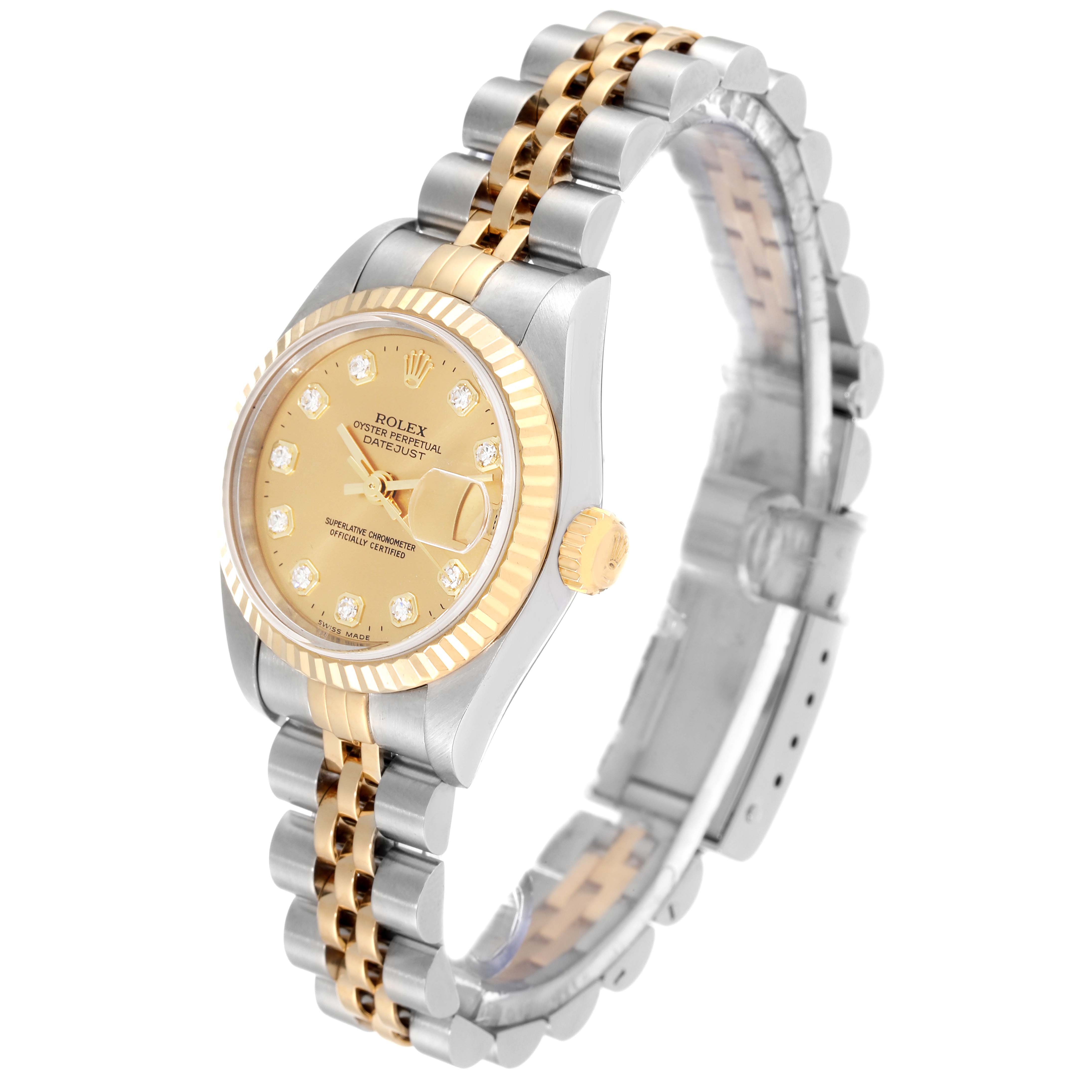 The Rolex Datejust 79173 Women's Steel and Gold (two tone) Champagne Dial 79173 Women's Steel and Gold (two tone) Champagne Dial watch is shown at a slight angle, displaying its gold dial, two-tone bracelet, and fluted bezel.
