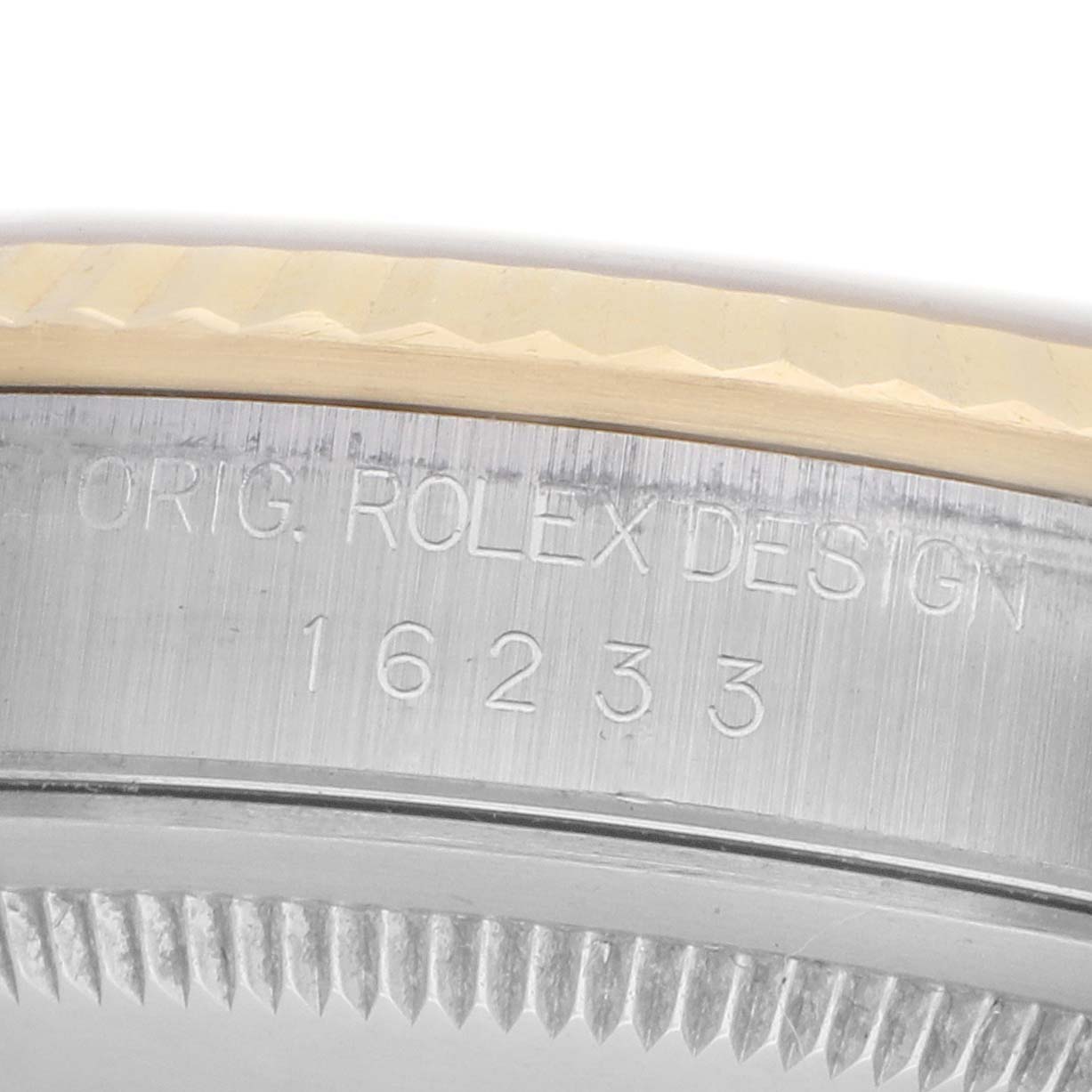 The image shows the engraved case back rim of a Rolex Datejust 16233 Men's Stainless Steel Champagne Dial, displaying "ORIG. ROLEX DESIGN" and the model number 16233.