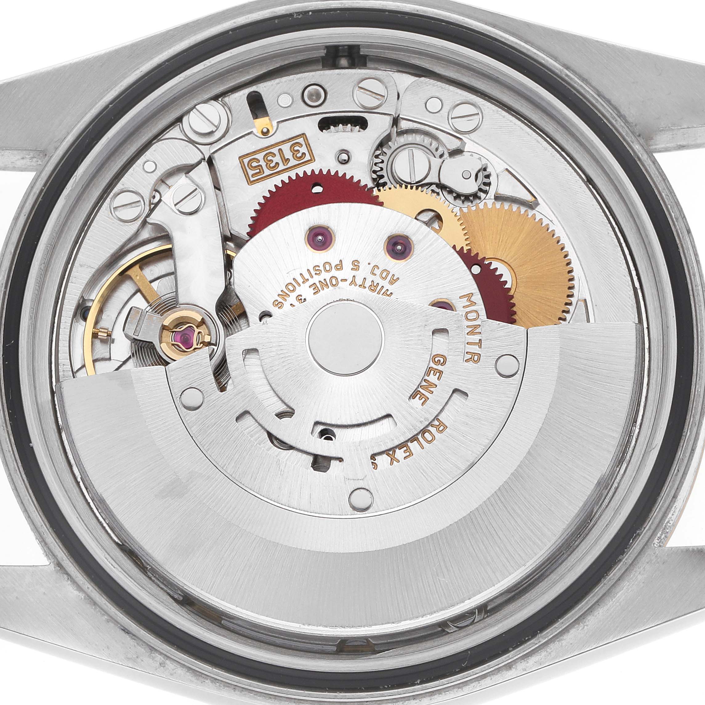 The image shows the internal movement of a Rolex Datejust 16233 Men's Stainless Steel Champagne Dial watch from a rear angle, highlighting its gears and mechanical components.