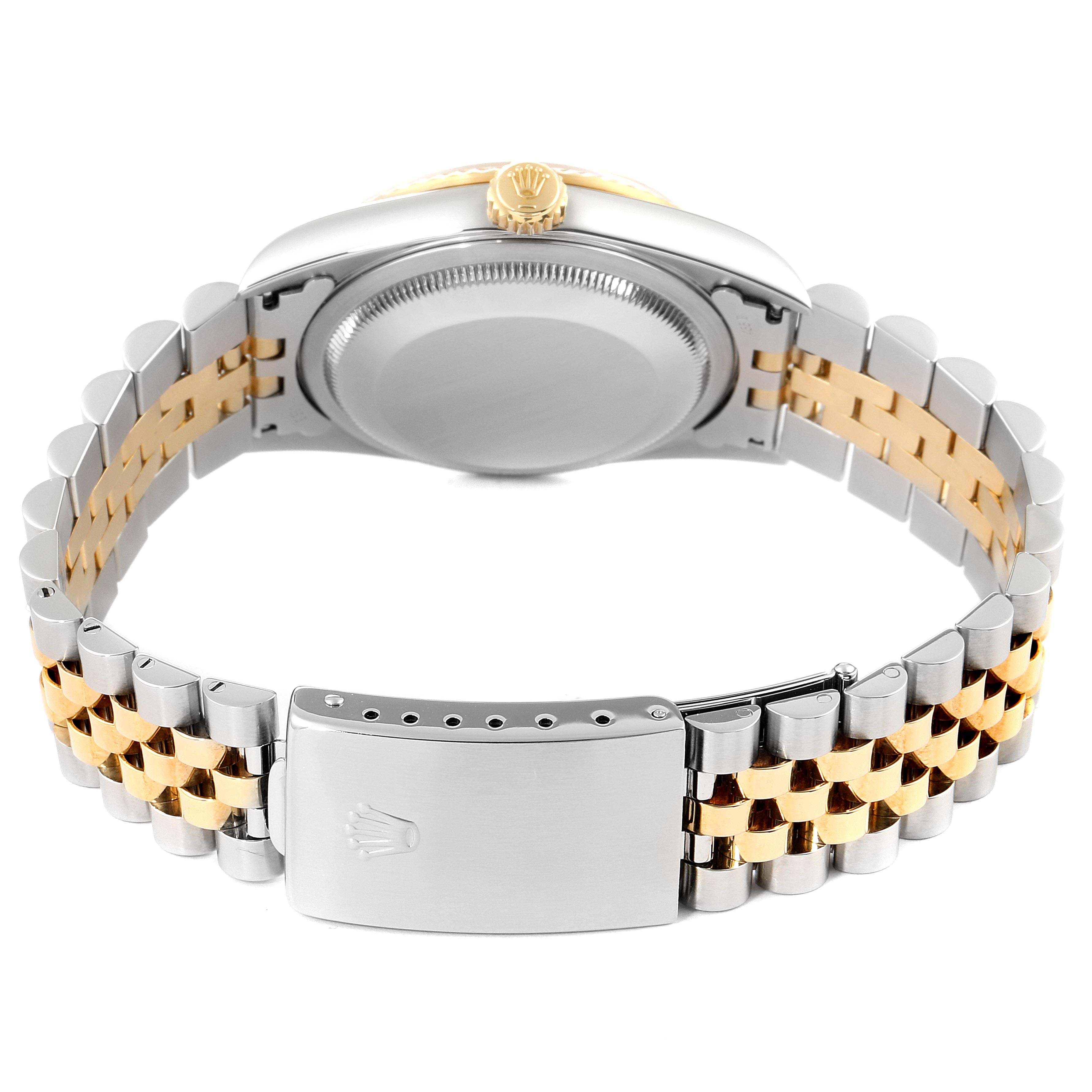 This image shows the back view of the Rolex Datejust 16233 Men
s Steel and Gold (two tone) Mother of Pearl Dial 16233 Men
s Steel and Gold (two tone) Mother of Pearl Dial watch, highlighting the bracelet and clasp.
