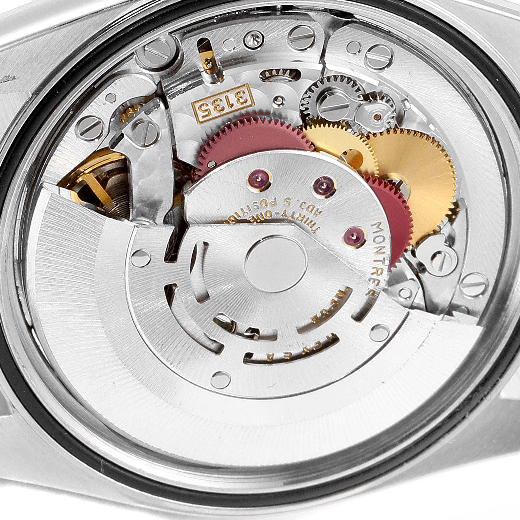 This image shows the inner mechanical movement of a Rolex Datejust 16233 Men
s Steel and Gold (two tone) Mother of Pearl Dial 16233 Men
s Steel and Gold (two tone) Mother of Pearl Dial watch, focusing on gears and intricate components.