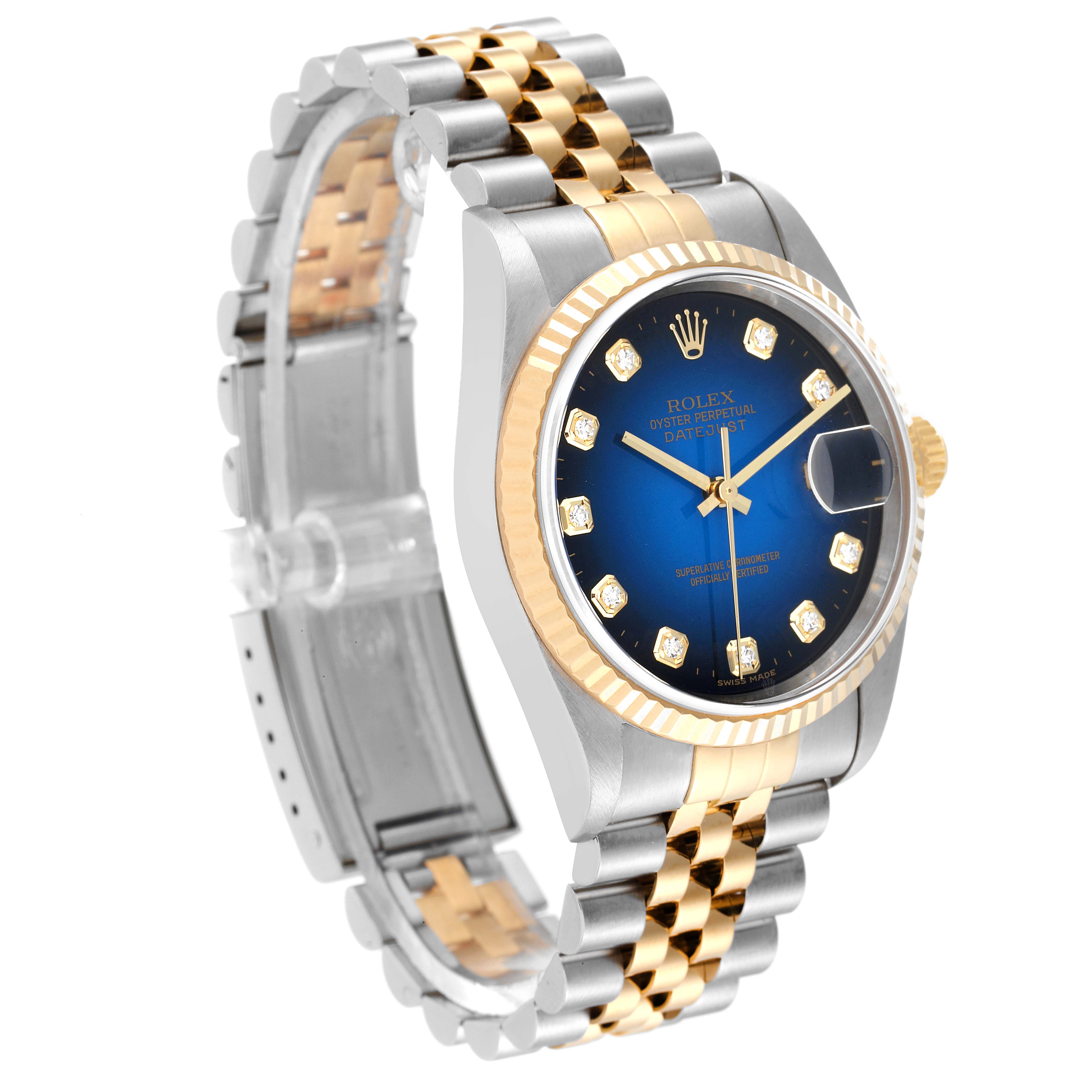 The image shows a Rolex Datejust 16233 Men's Steel and Gold (two tone) Blue Dial 16233 Men's Steel and Gold (two tone) Blue Dial watch angled to display the face, bezel, case, and partially open bracelet.