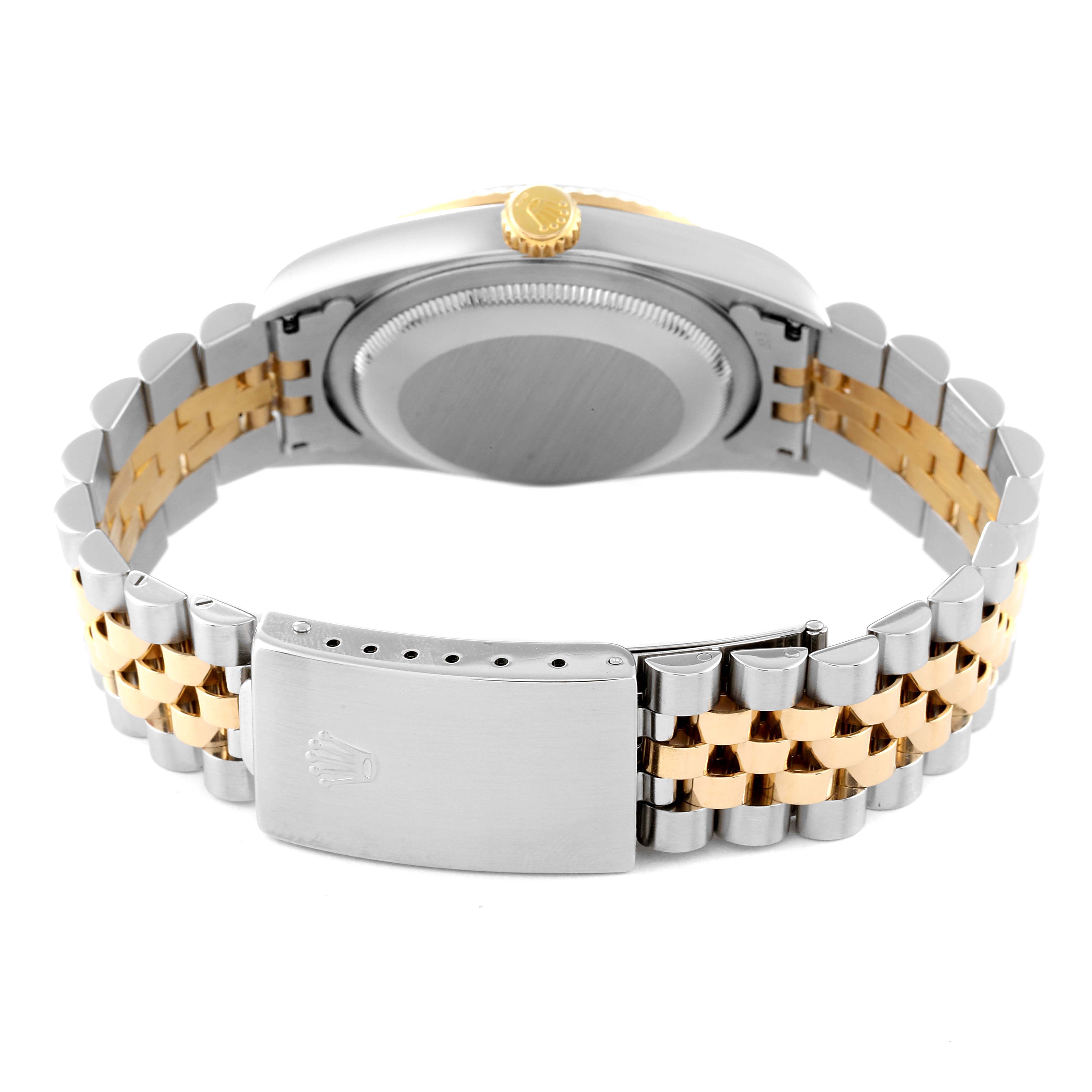 This image shows the back case and bracelet of a Rolex Datejust 16233 Men's Steel and Gold (two tone) Blue Dial 16233 Men's Steel and Gold (two tone) Blue Dial model watch, highlighting its two-tone metal design.