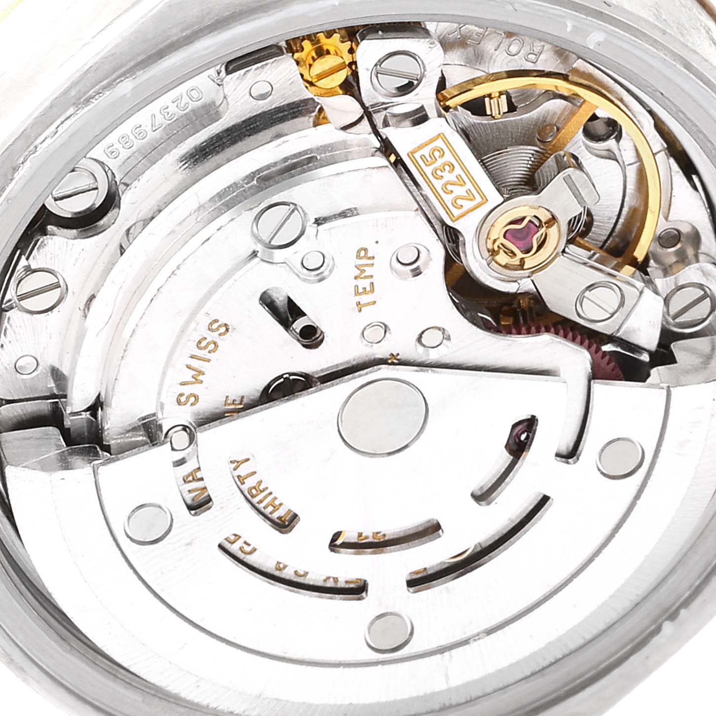 The image shows a close-up view of the internal mechanical movement of a Rolex Datejust 79173 Women's Steel and Gold (two tone) White Dial 79173 Women's Steel and Gold (two tone) White Dial watch.