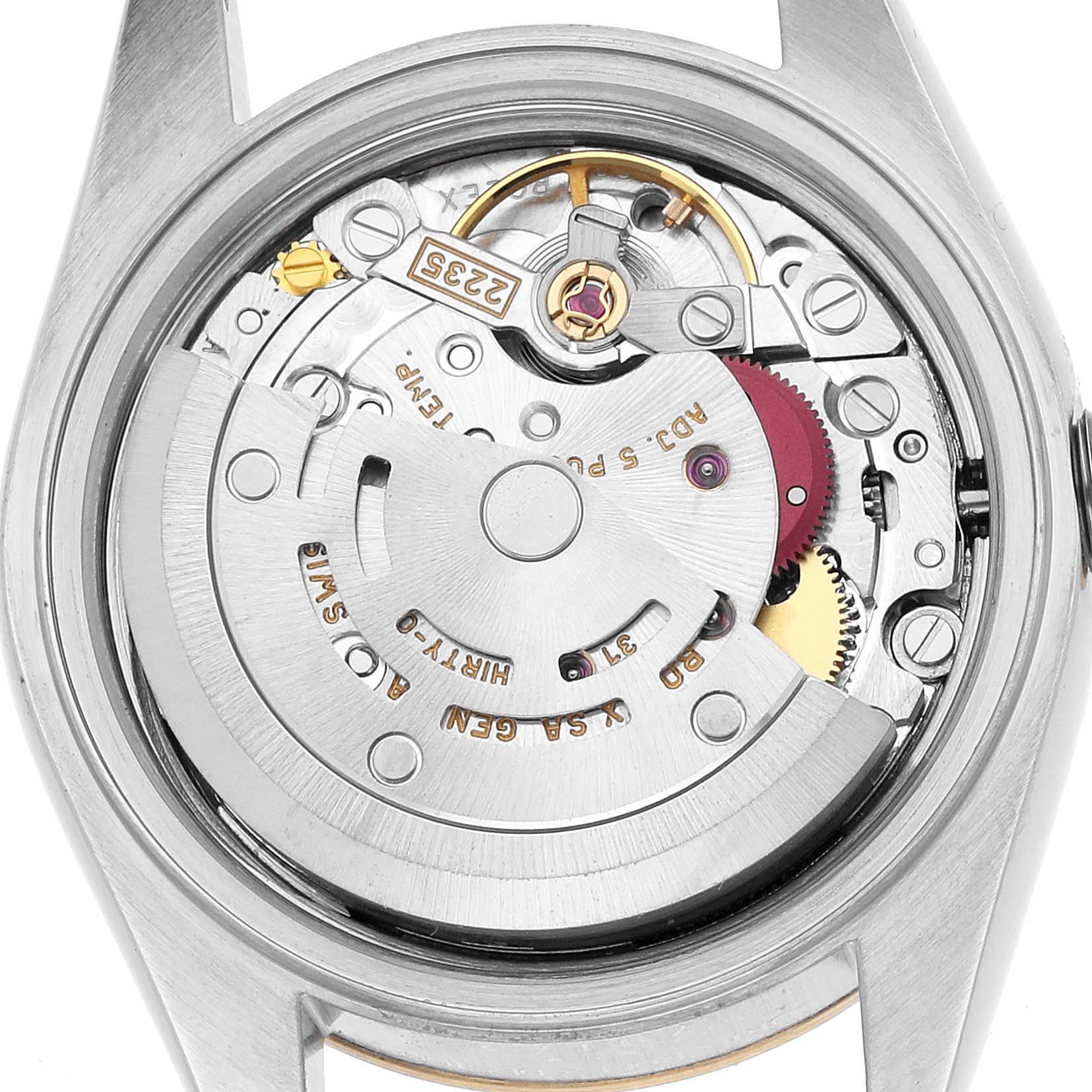 The image shows the movement of a Rolex Datejust 79173 Women's Steel and Gold (two tone) White Dial watch from the rear, highlighting gears, jewels, and the rotor.