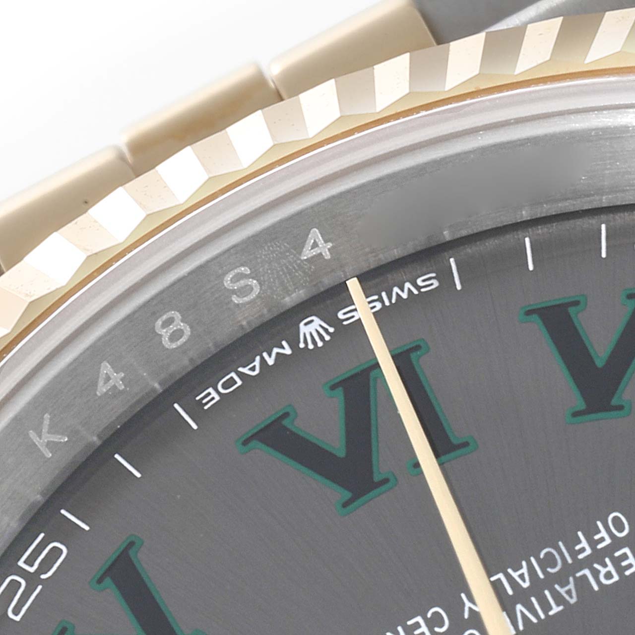 The image shows a close-up angle of the bezel, part of the bracelet, and a portion of the dial of the Rolex Datejust 126233 Men's Steel and Gold (two tone) Grey Dial 126233 Men's Steel and Gold (two tone) Grey Dial watch.