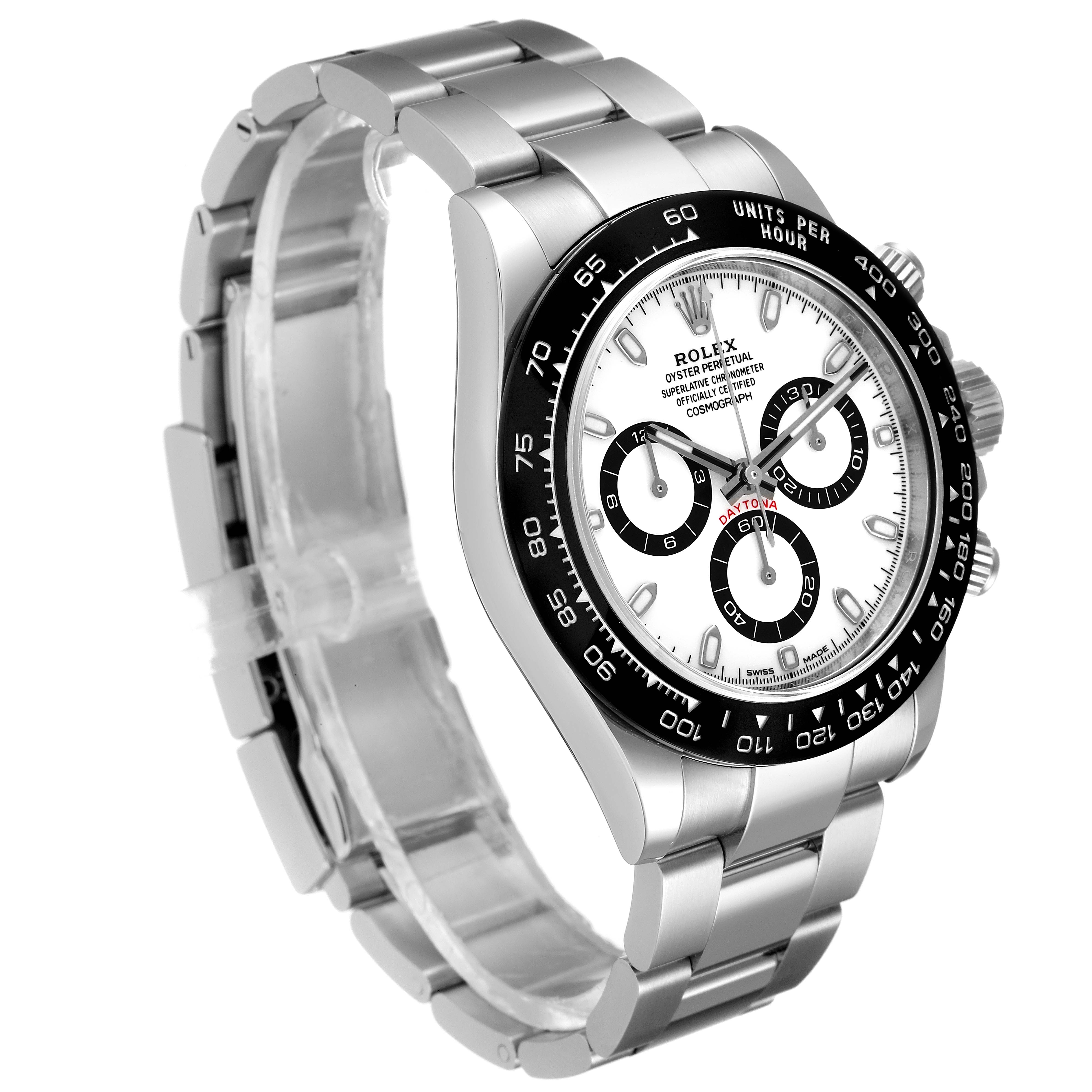 The image shows a Rolex Daytona 116500 Men's Stainless Steel White Dial 116500 Men's Stainless Steel White Dial watch from an angled view, highlighting its stainless steel bracelet, bezel, and face.