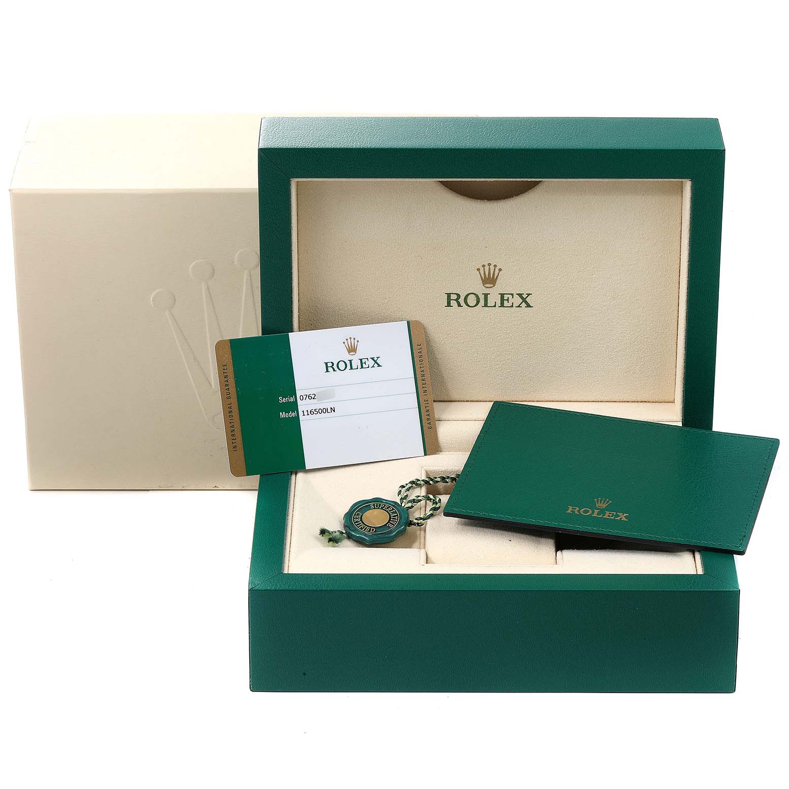 The image shows the packaging and accessories of a Rolex Daytona 116500 Men's Stainless Steel White Dial 116500 Men's Stainless Steel White Dial including the box, warranty card, booklet, and hang tag.