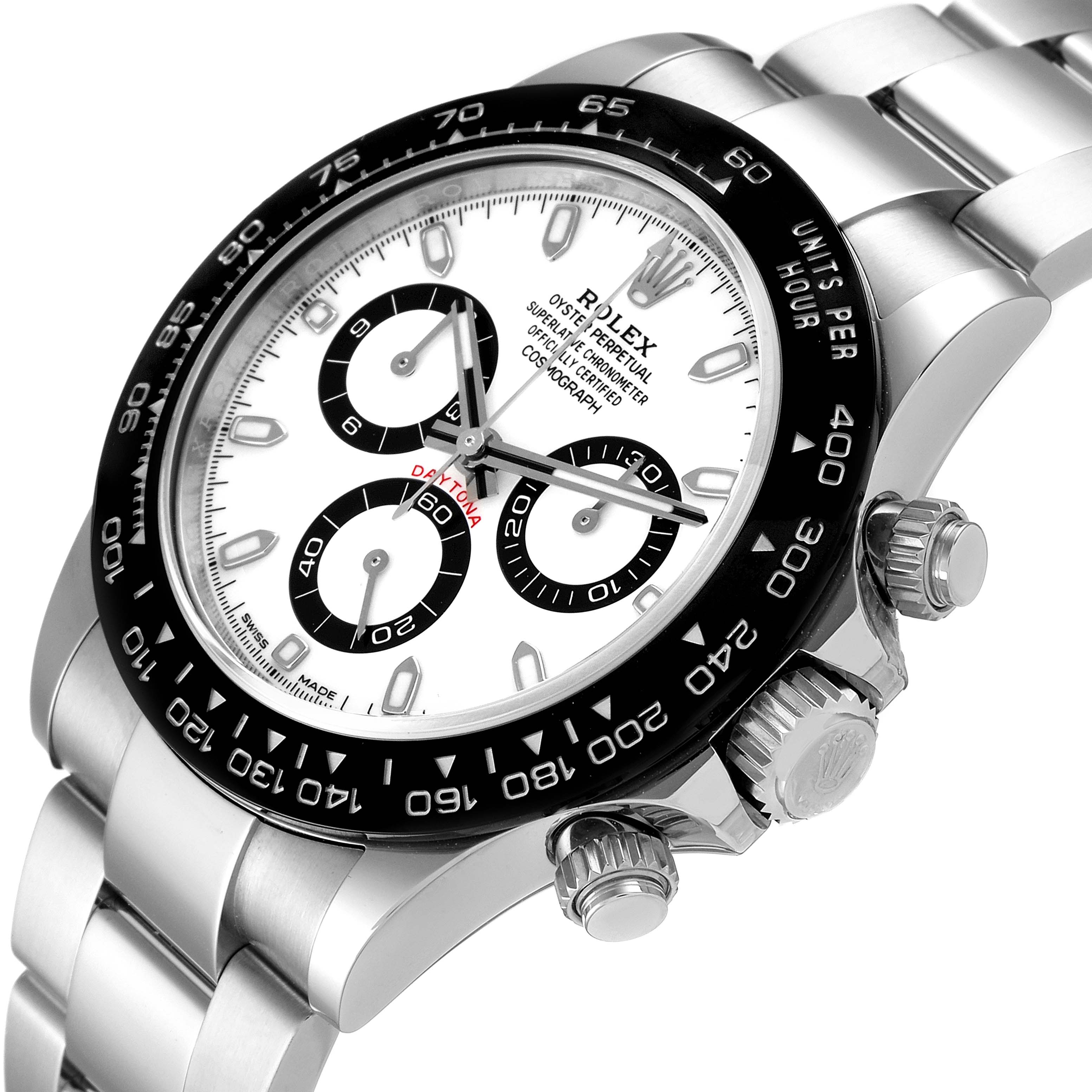 The image shows a close-up angle of a Rolex Daytona 116500 Men's Stainless Steel White Dial 116500 Men's Stainless Steel White Dial watch, highlighting the face, bezel, crown, and part of the bracelet.