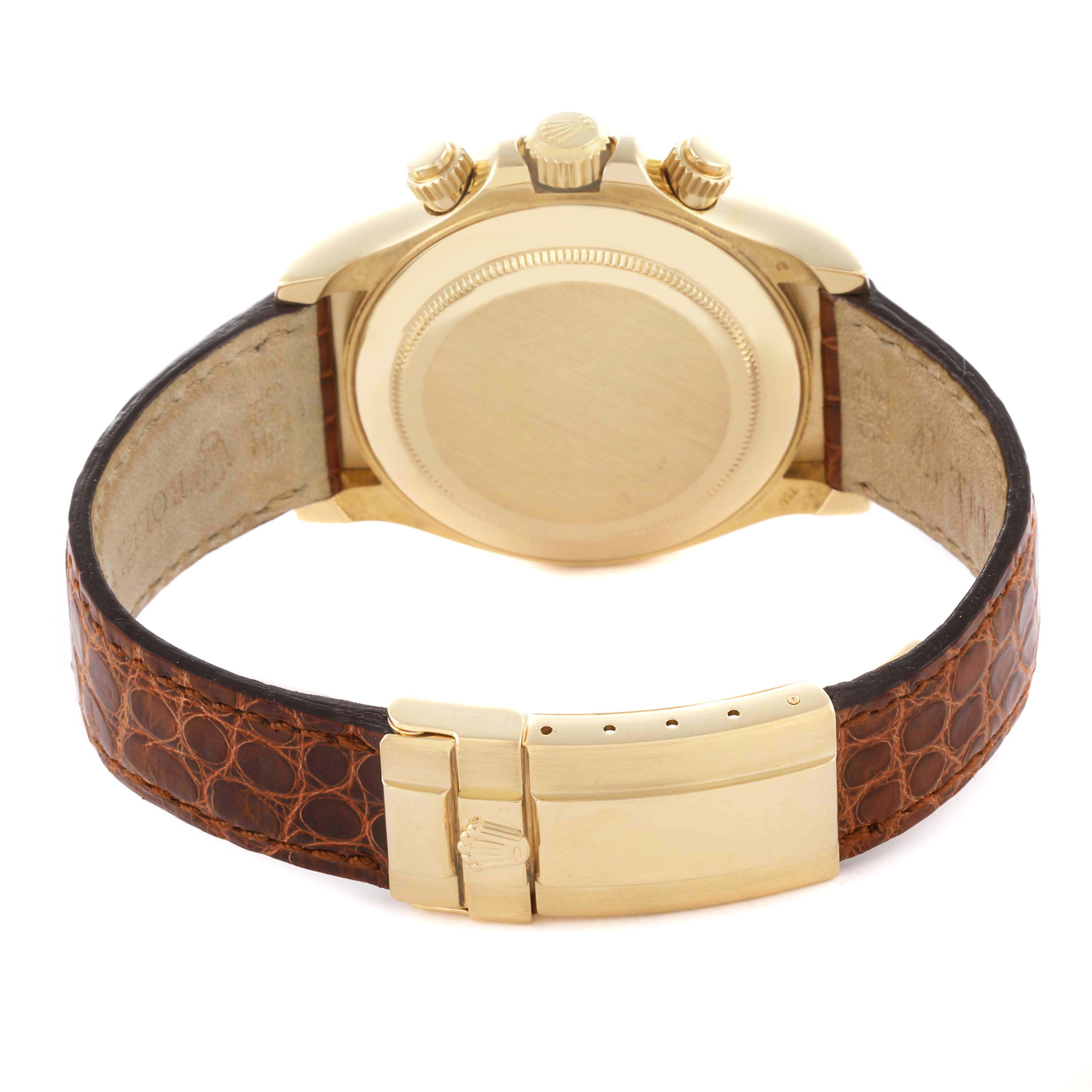 The image shows the back view of a Rolex Daytona 116518 Men's Yellow Gold Champagne Dial watch, highlighting its golden case, crown, pushers, and leather strap.