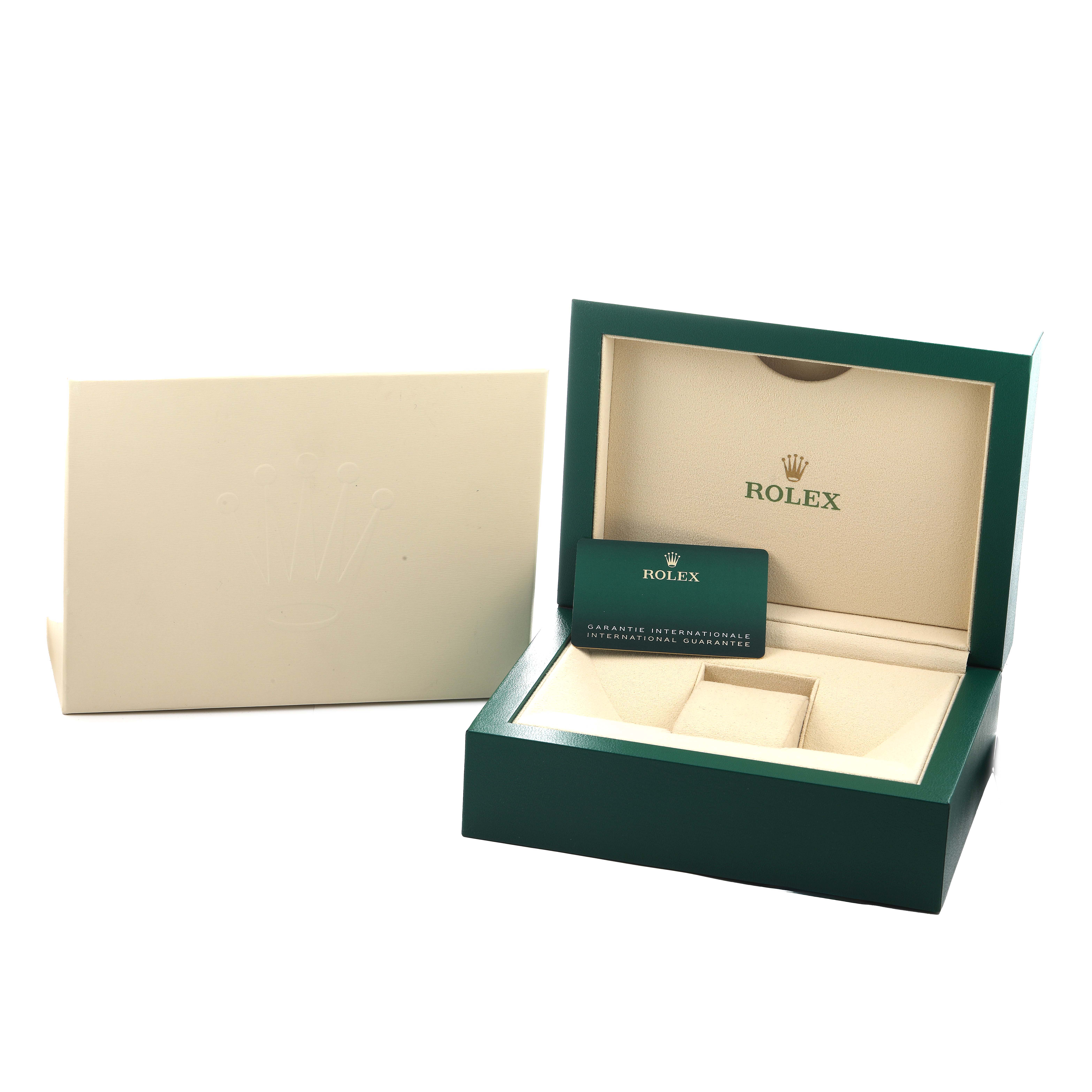 The image shows a Rolex GMT-Master 126710 Men's Stainless Steel Black Dial box and warranty card at a three-quarter angle, highlighting the box and card design.