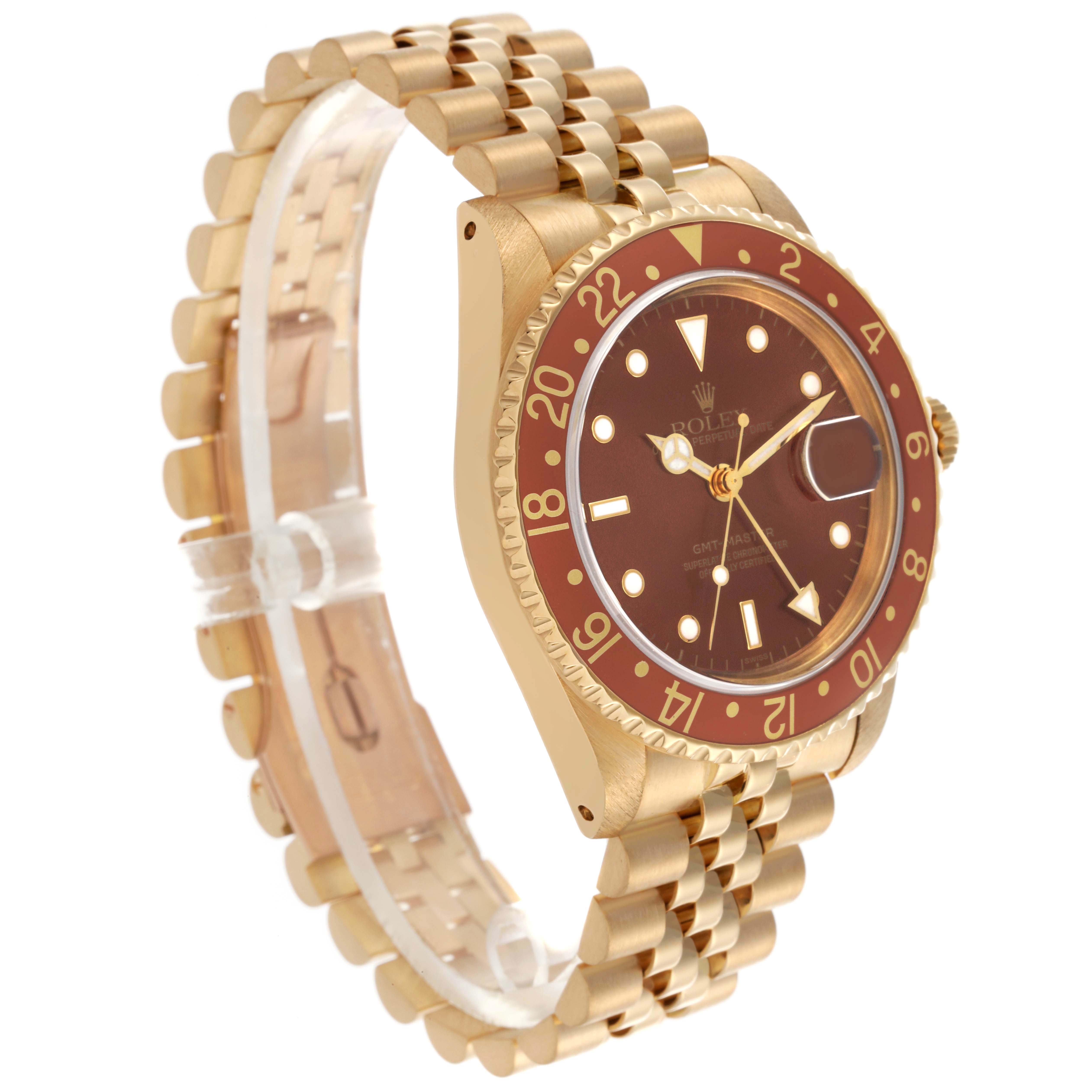 The Rolex GMT-Master 16758 Men's Yellow Gold Brown Dial 16758 Men's Yellow Gold Brown Dial watch is shown at a side angle, highlighting the face, bezel, and gold bracelet.