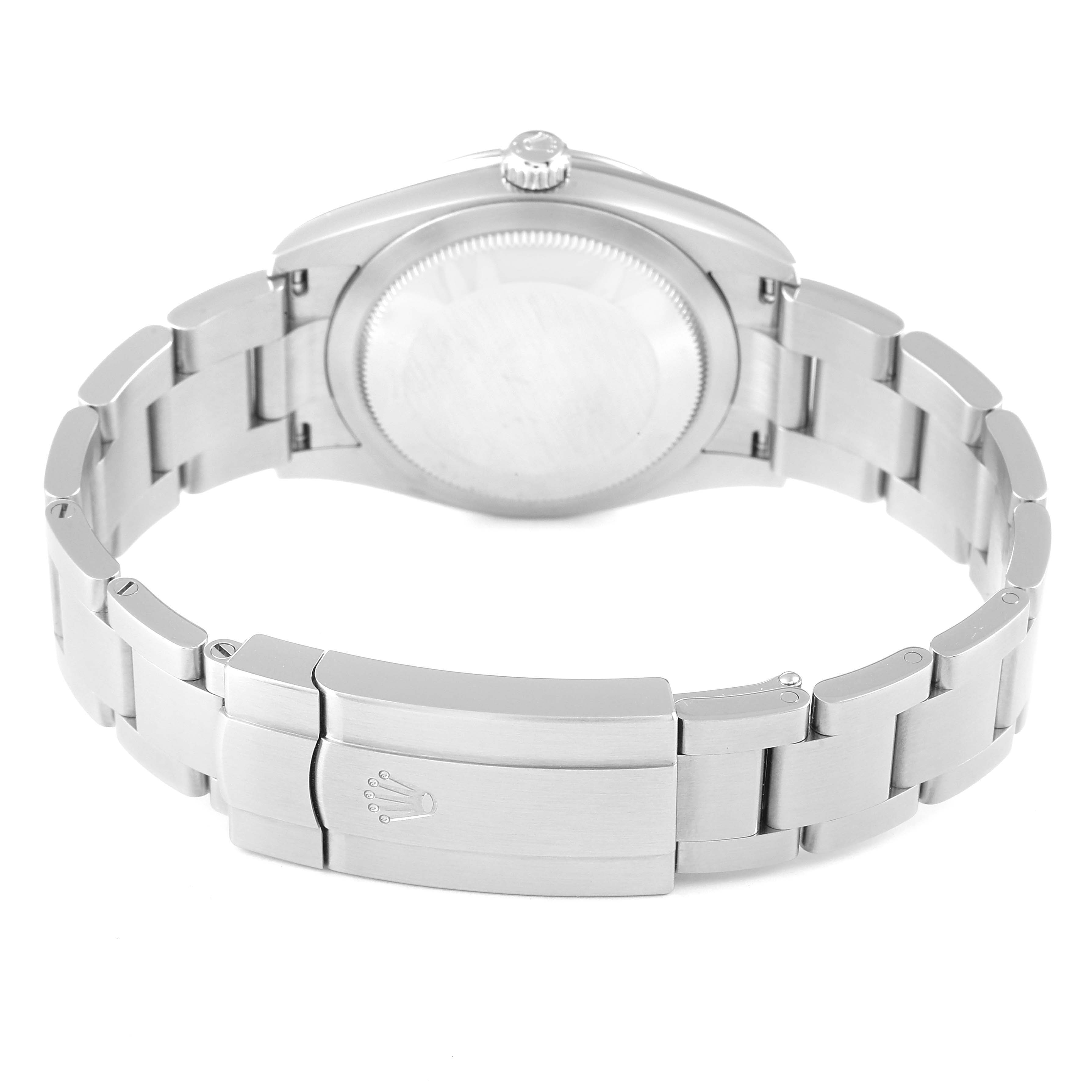 This image shows the back view of a Rolex Oyster Perpetual 124200 Men's Stainless Steel Silver Dial 124200 Men's Stainless Steel Silver Dial watch, highlighting the case back and metal bracelet with the clasp.