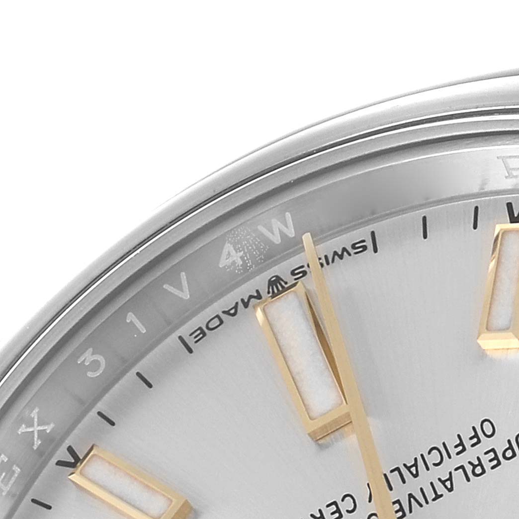 This image shows a close-up of the dial and hands at an angle for the Rolex Oyster Perpetual 124200 Men's Stainless Steel Silver Dial 124200 Men's Stainless Steel Silver Dial watch, highlighting the 3 and 4 o'clock markers.