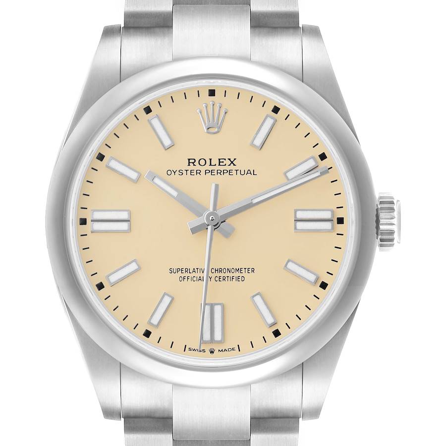 The Rolex Oyster Perpetual 134300 Men's Stainless Steel Beige Dial watch is shown from the front, highlighting its beige dial, hands, indices, and part of the bracelet.