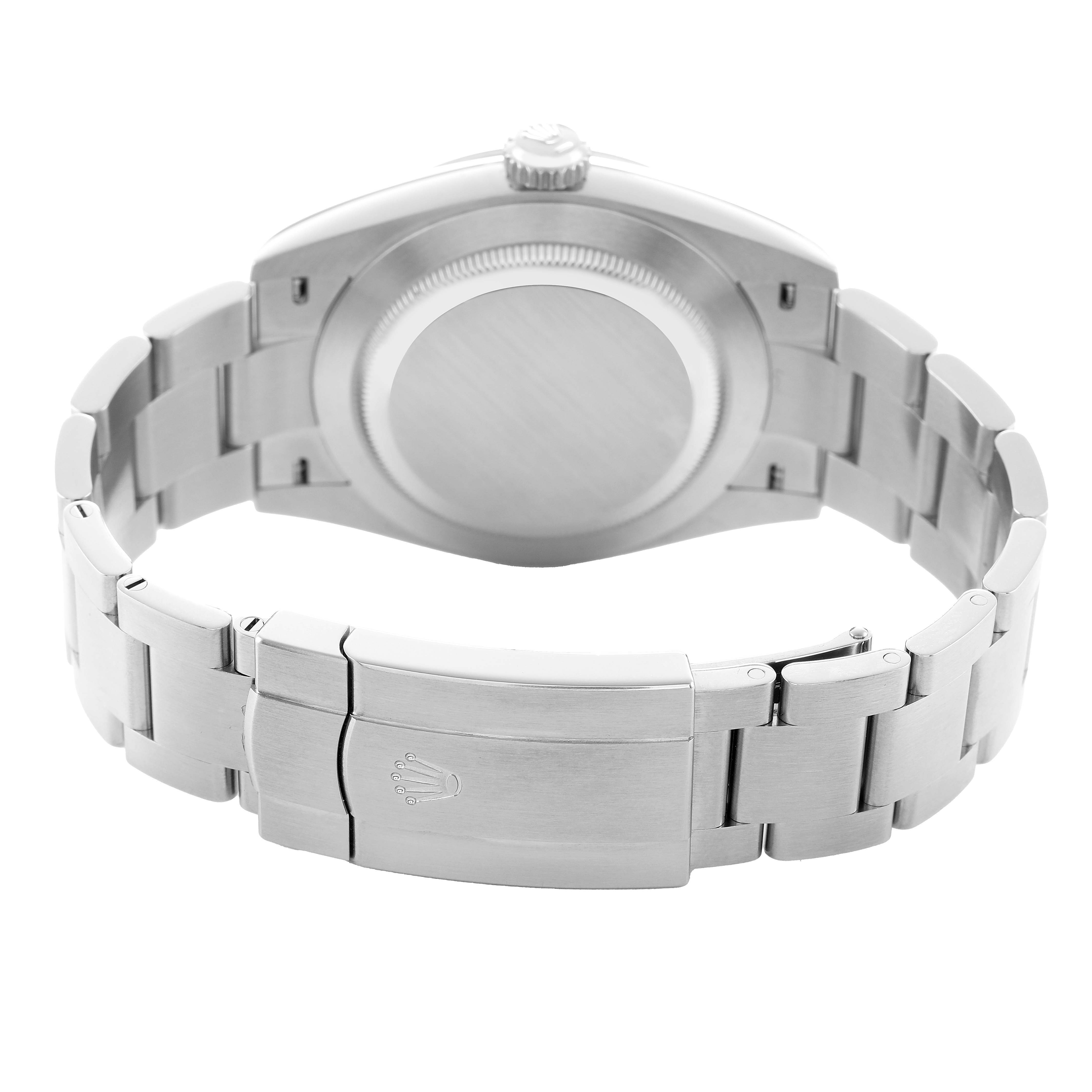 The image shows the back of the Rolex Oyster Perpetual 134300 Men's Stainless Steel Beige Dial watch, including the case back and clasp of the metal bracelet.