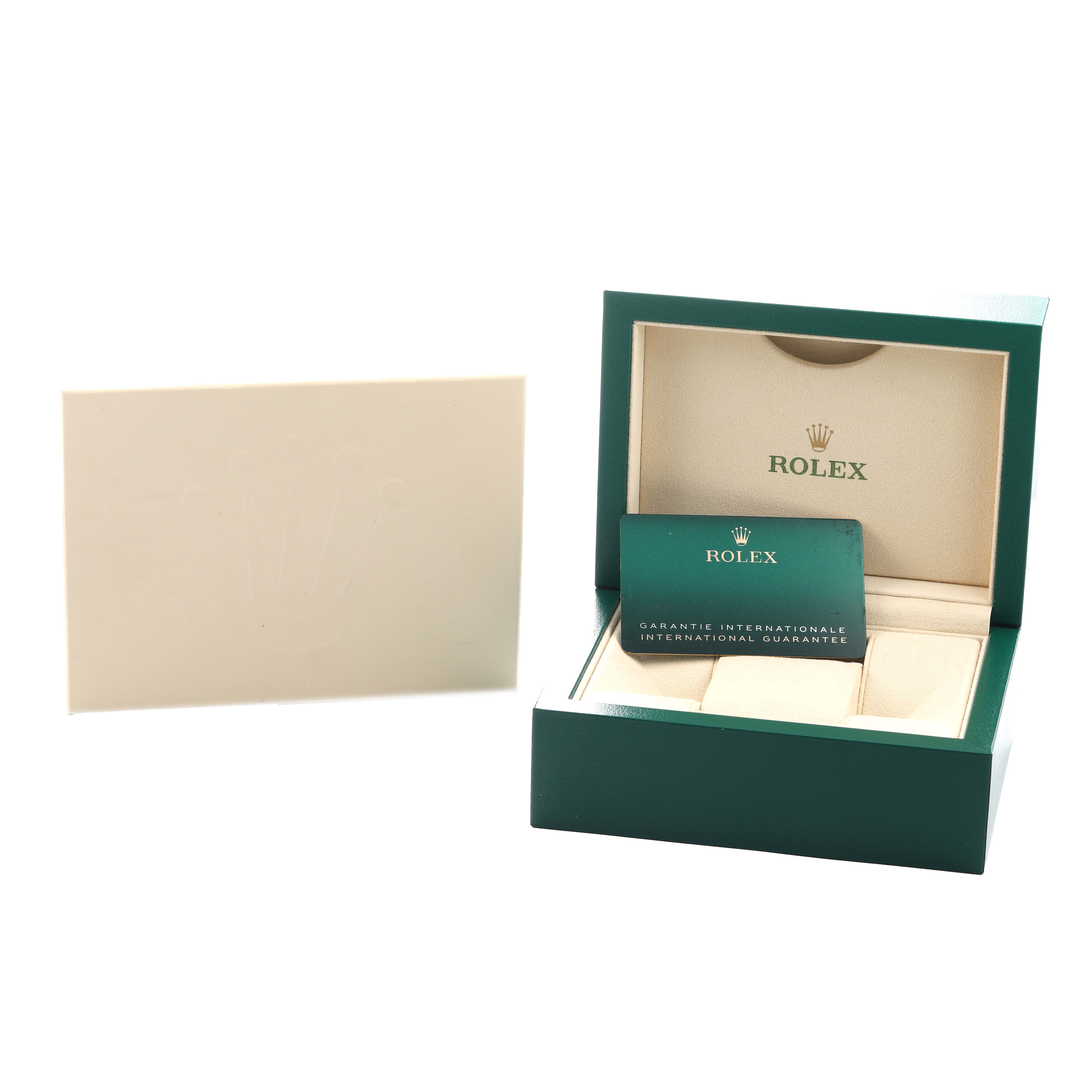 The image shows a Rolex Oyster Perpetual 134300 Men's Stainless Steel Beige Dial box, open to reveal the interior and the international guarantee card.