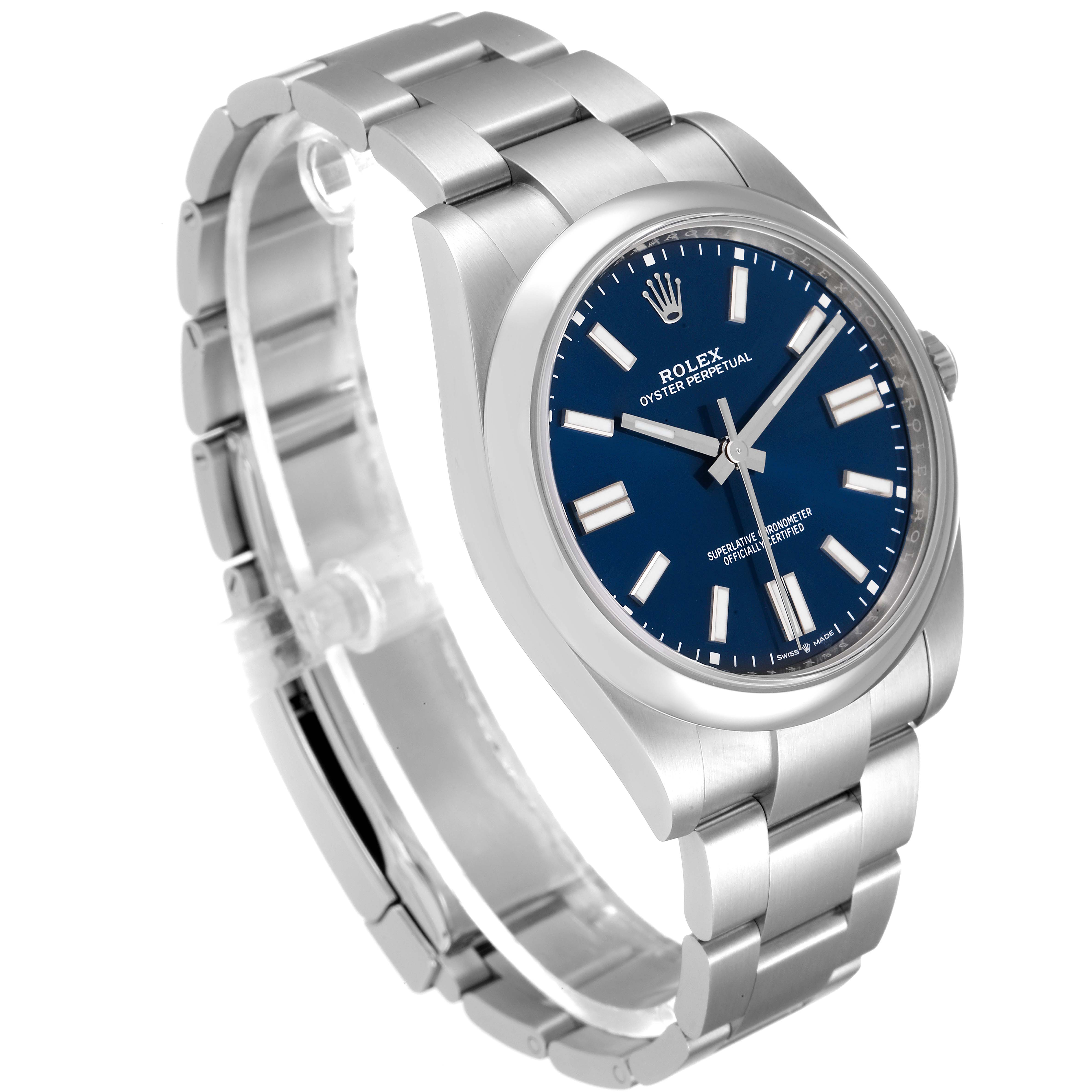 The image shows a side angle of a Rolex Oyster Perpetual 124300 Men's Stainless Steel Blue Dial 124300 Men's Stainless Steel Blue Dial watch, highlighting its stainless steel bracelet and blue dial.