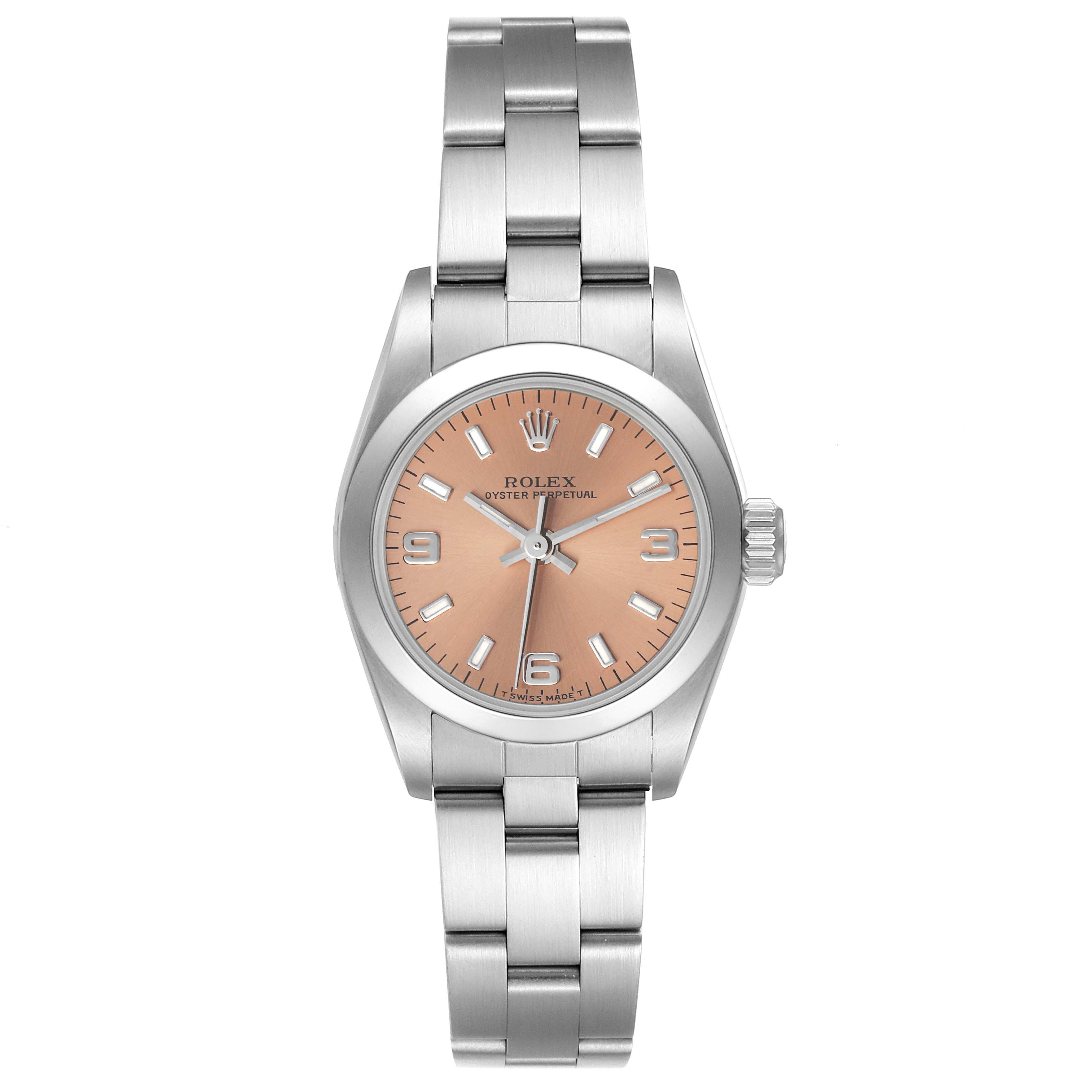 This image shows a Rolex Oyster Perpetual 67180 Women
s Stainless Steel Pink Dial 67180 Women
s Stainless Steel Pink Dial watch from a front angle, displaying its face, bracelet, and crown.