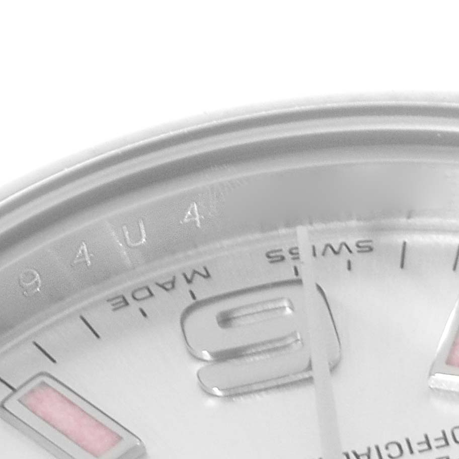 The image shows a close-up of the dial and the edge of the bezel of a Rolex Oyster Perpetual 176200 Women's Stainless Steel Silver Dial 176200 Women's Stainless Steel Silver Dial model.