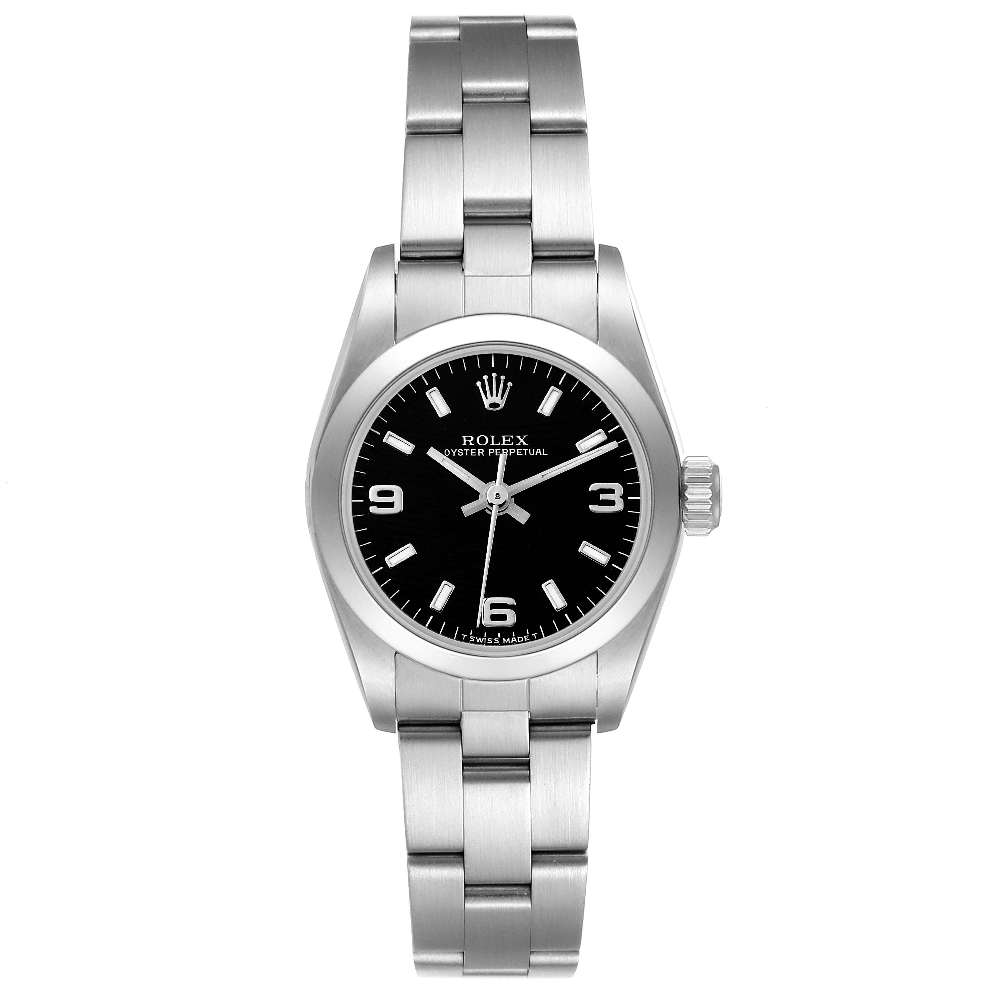 The Rolex Oyster Perpetual 67180 Women's Stainless Steel Black Dial 67180 Women's Stainless Steel Black Dial watch is shown from a top-down angle, displaying the full face, bracelet, and crown.