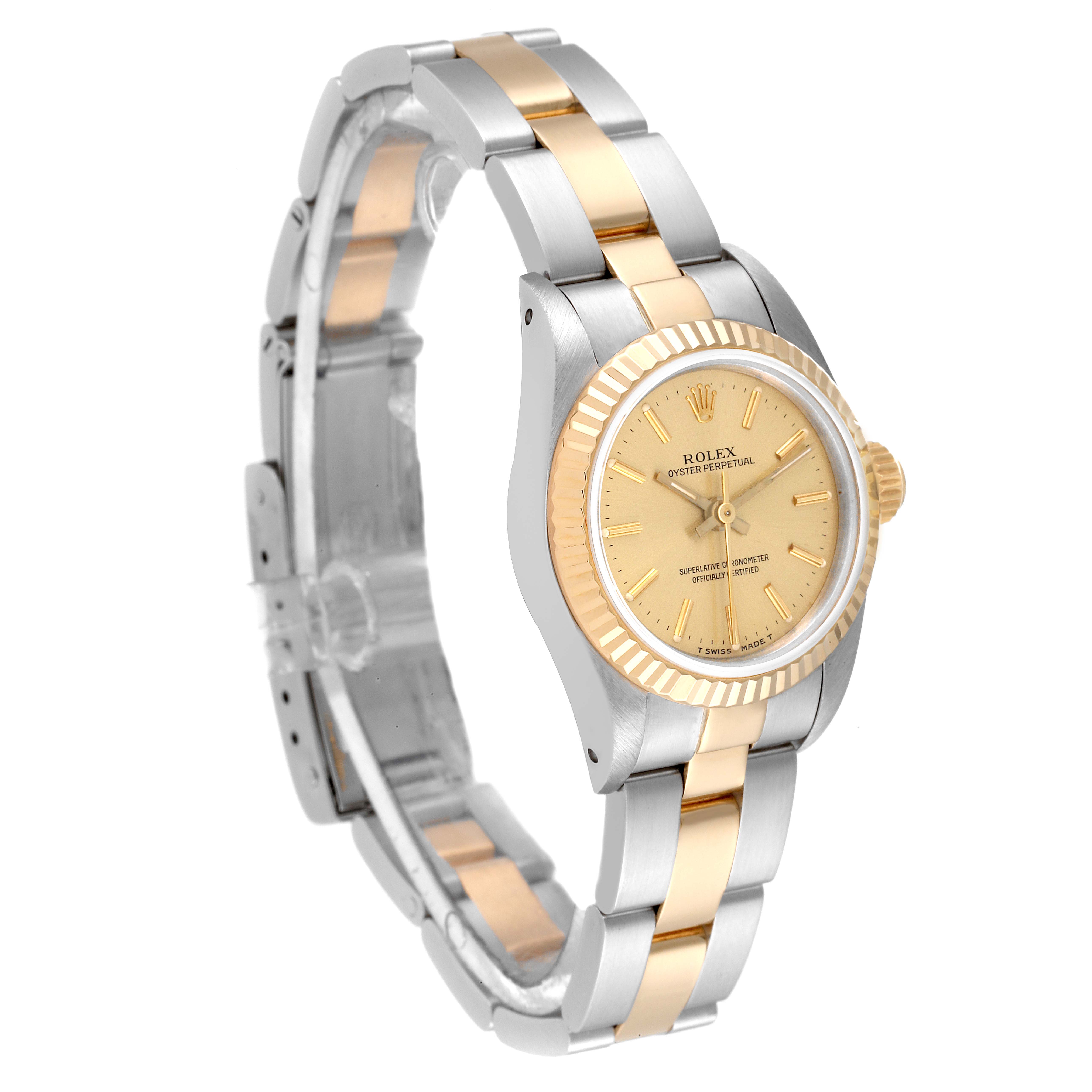The Rolex Oyster Perpetual 67193 Women's Steel and Gold (two tone) Champagne Dial 67193 Women's Steel and Gold (two tone) Champagne Dial watch is shown at an oblique angle, highlighting its gold and silver bracelet and dial.