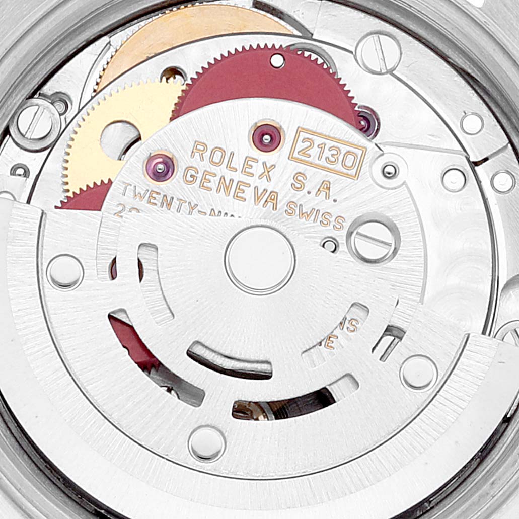 This image shows a close-up angle of the movement mechanism inside a Rolex Oyster Perpetual 67193 Women's Steel and Gold (two tone) Champagne Dial 67193 Women's Steel and Gold (two tone) Champagne Dial watch.