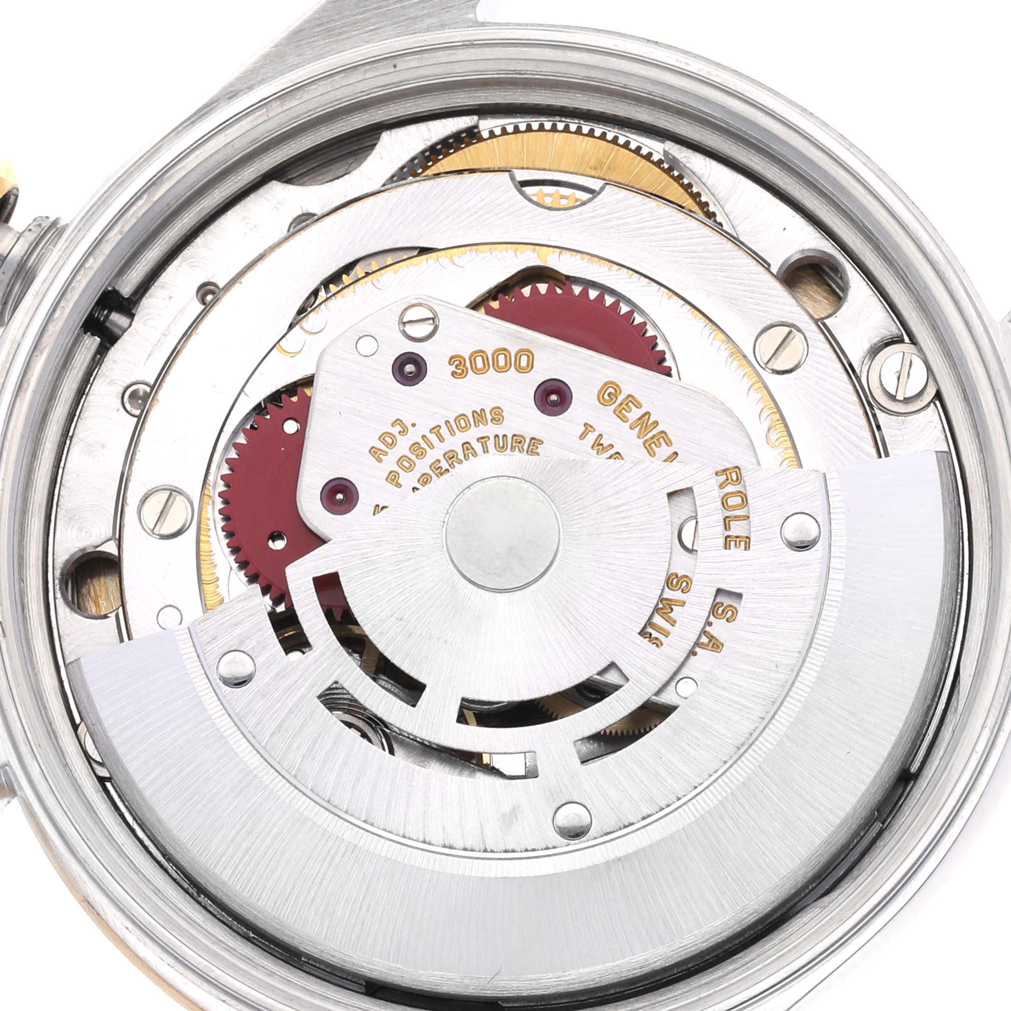 The image shows the internal mechanism of the Rolex Oyster Perpetual 14233 Men's Steel and Gold (two tone) Champagne Dial 14233 Men's Steel and Gold (two tone) Champagne Dial watch, focusing on the movement components.