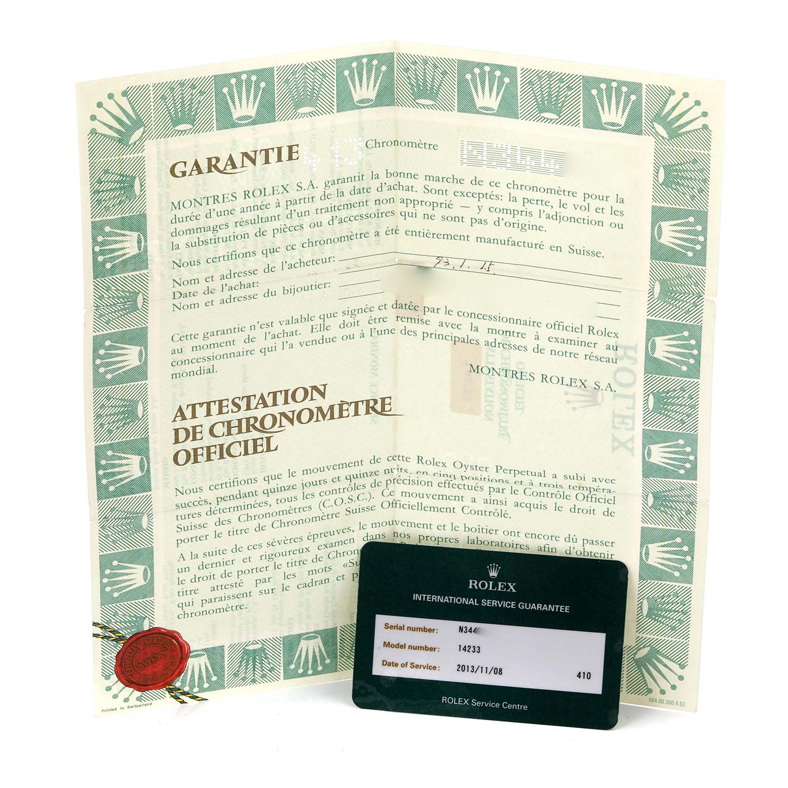 The image shows the warranty and service card for a Rolex Oyster Perpetual 14233 Men's Steel and Gold (two tone) Champagne Dial 14233 Men's Steel and Gold (two tone) Champagne Dial, displayed flat and tilted.