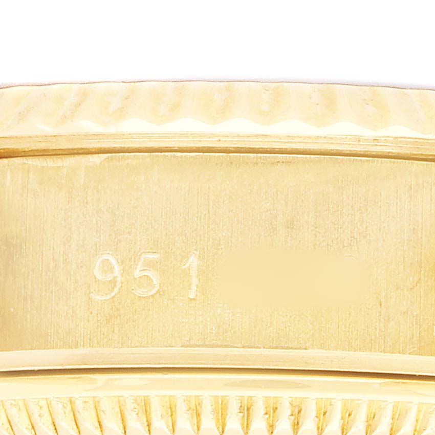 The image shows a close-up of the inner band with markings of a Rolex President 69178 Women's Yellow Gold Black Dial watch.