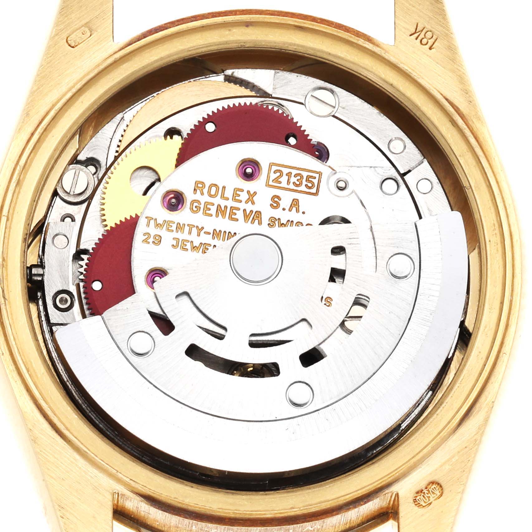 The image shows the Rolex President 69288 Women's Yellow Gold Blue Dial model's movement and inner workings from the back, highlighting gears and components.