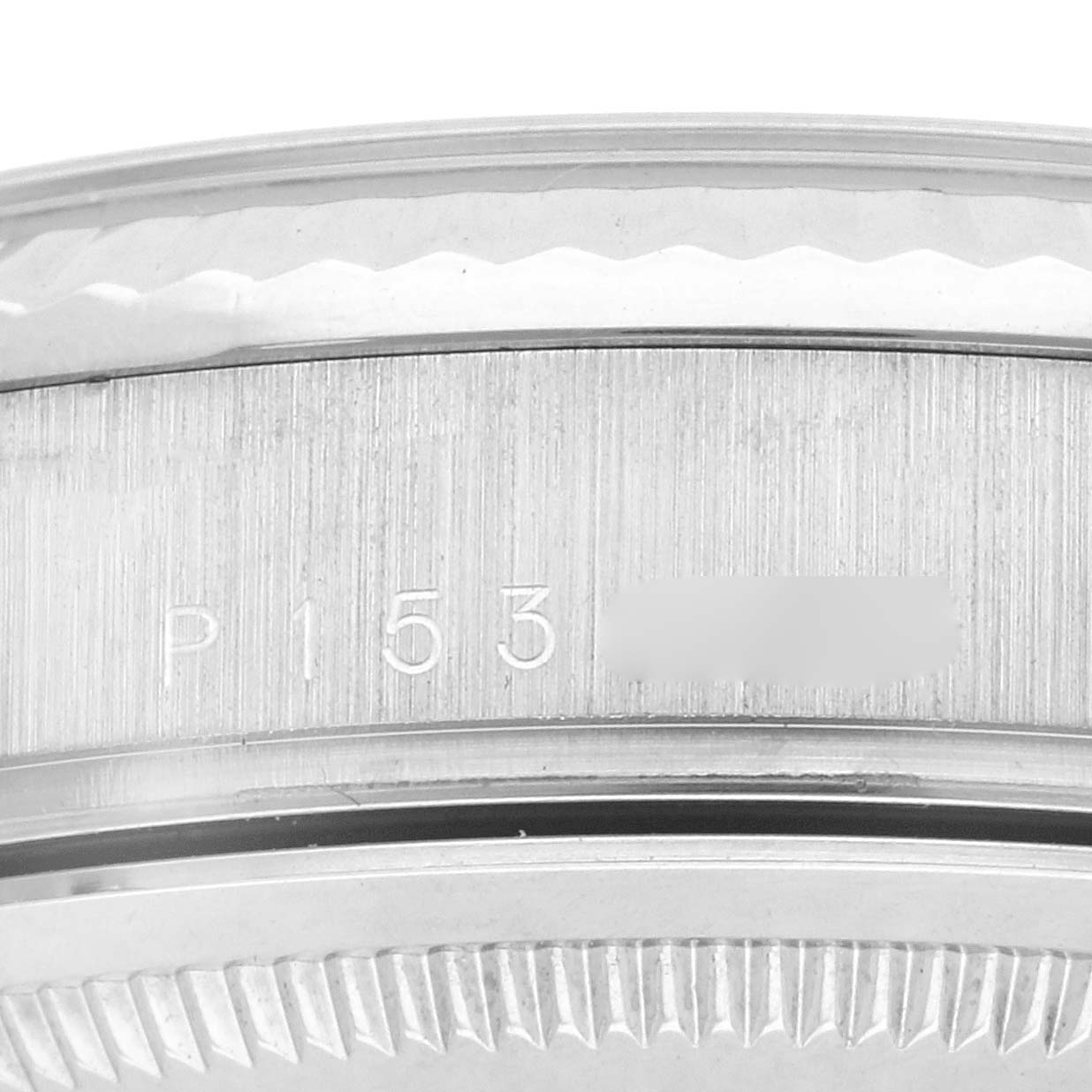The image shows a side view focusing on the engraved case edge of the Rolex President 118239A Men's White Gold Silver Dial 118239A Men's White Gold Silver Dial model.