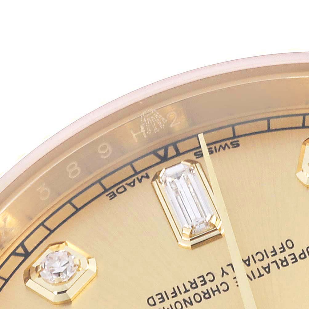 The image shows a close-up of the dial and markers of a Rolex President 118238 Men
s Yellow Gold Champagne Dial 118238 Men
s Yellow Gold Champagne Dial watch with diamond hour markers.