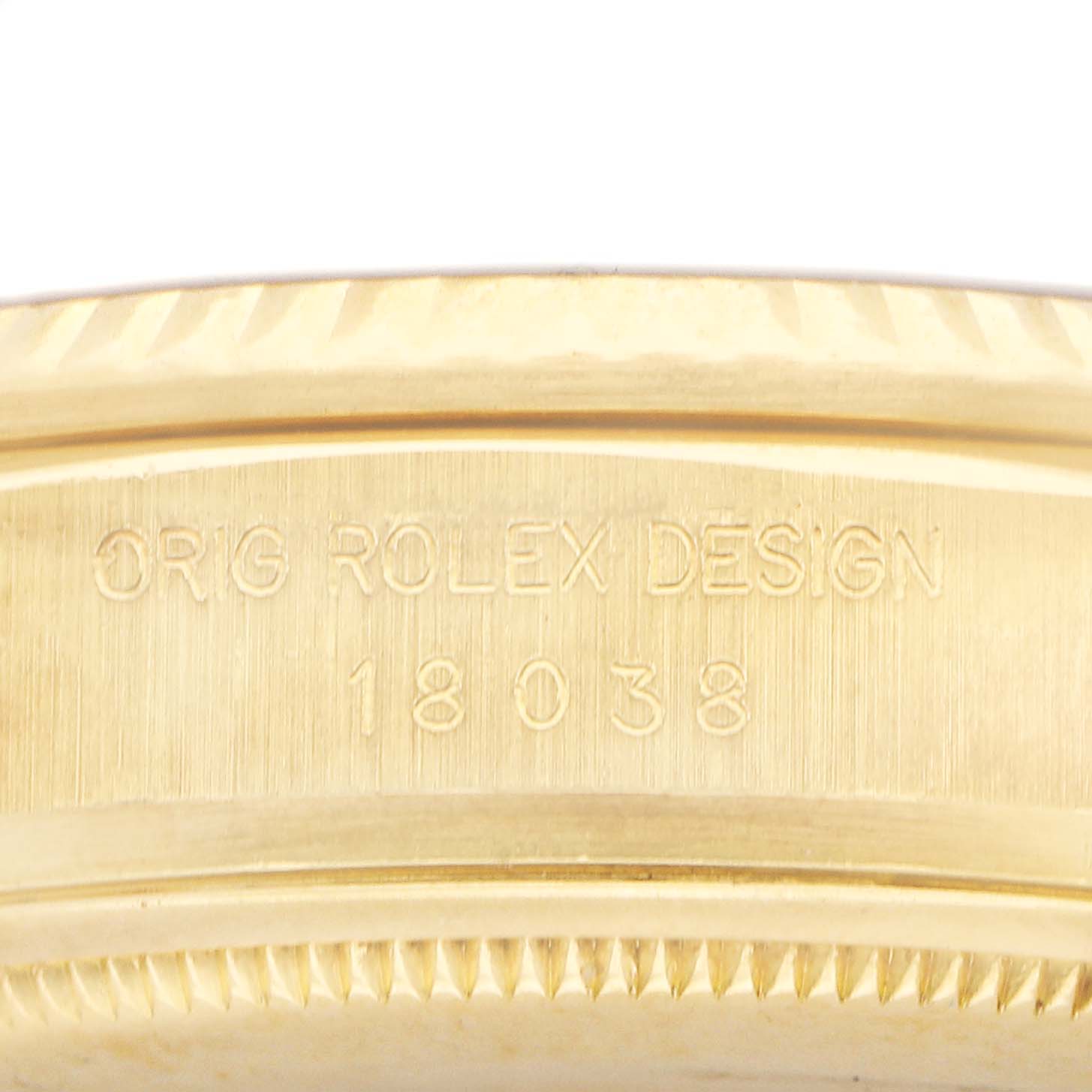 The image shows a close-up of the side engraving on a Rolex President 18038 Men's Yellow Gold Champagne Dial watch, displaying "ORIG ROLEX DESIGN 18038".
